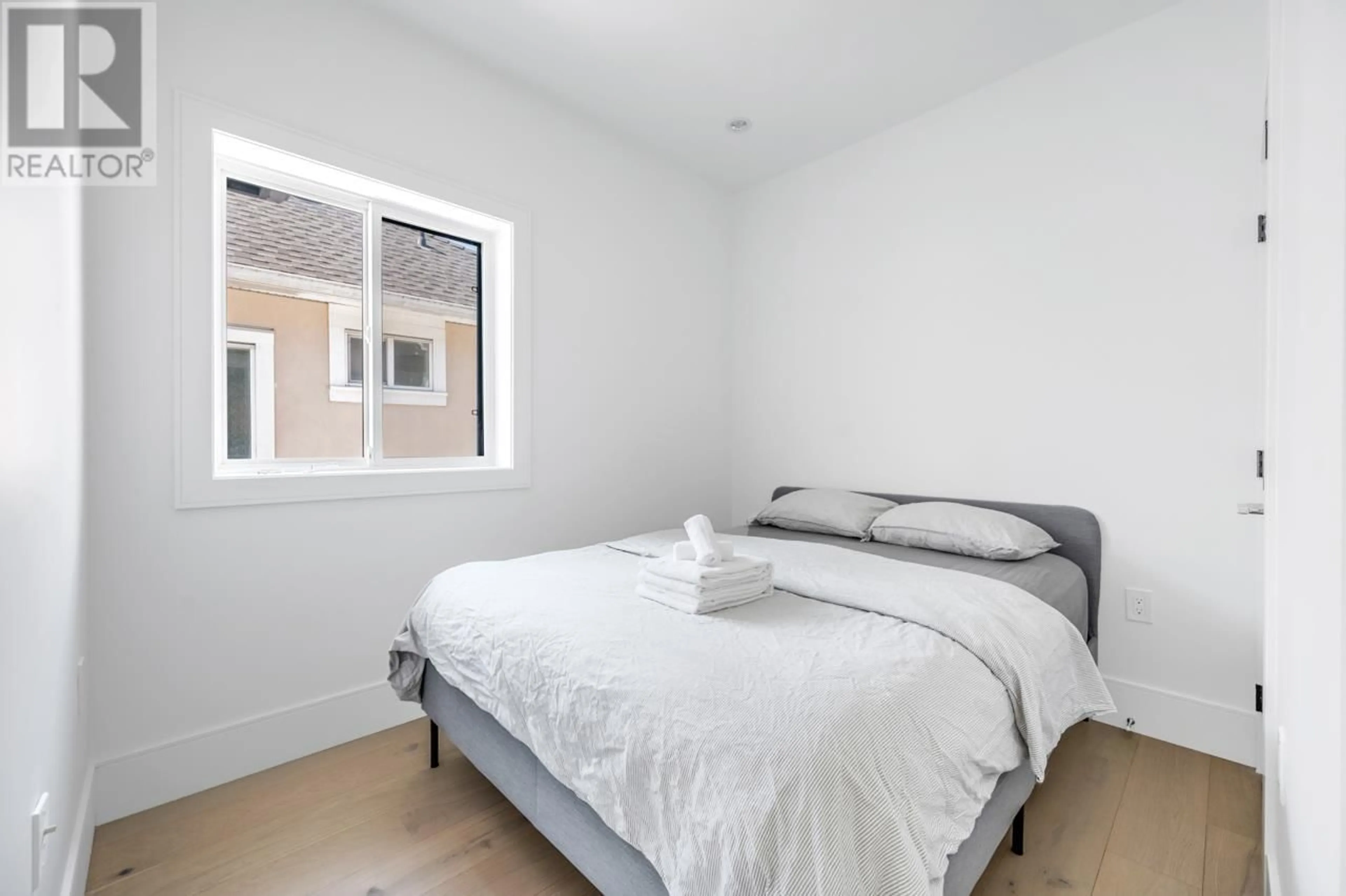 Bedroom with bed, unknown for 1319 E 62ND AVENUE, Vancouver British Columbia V5X2H4