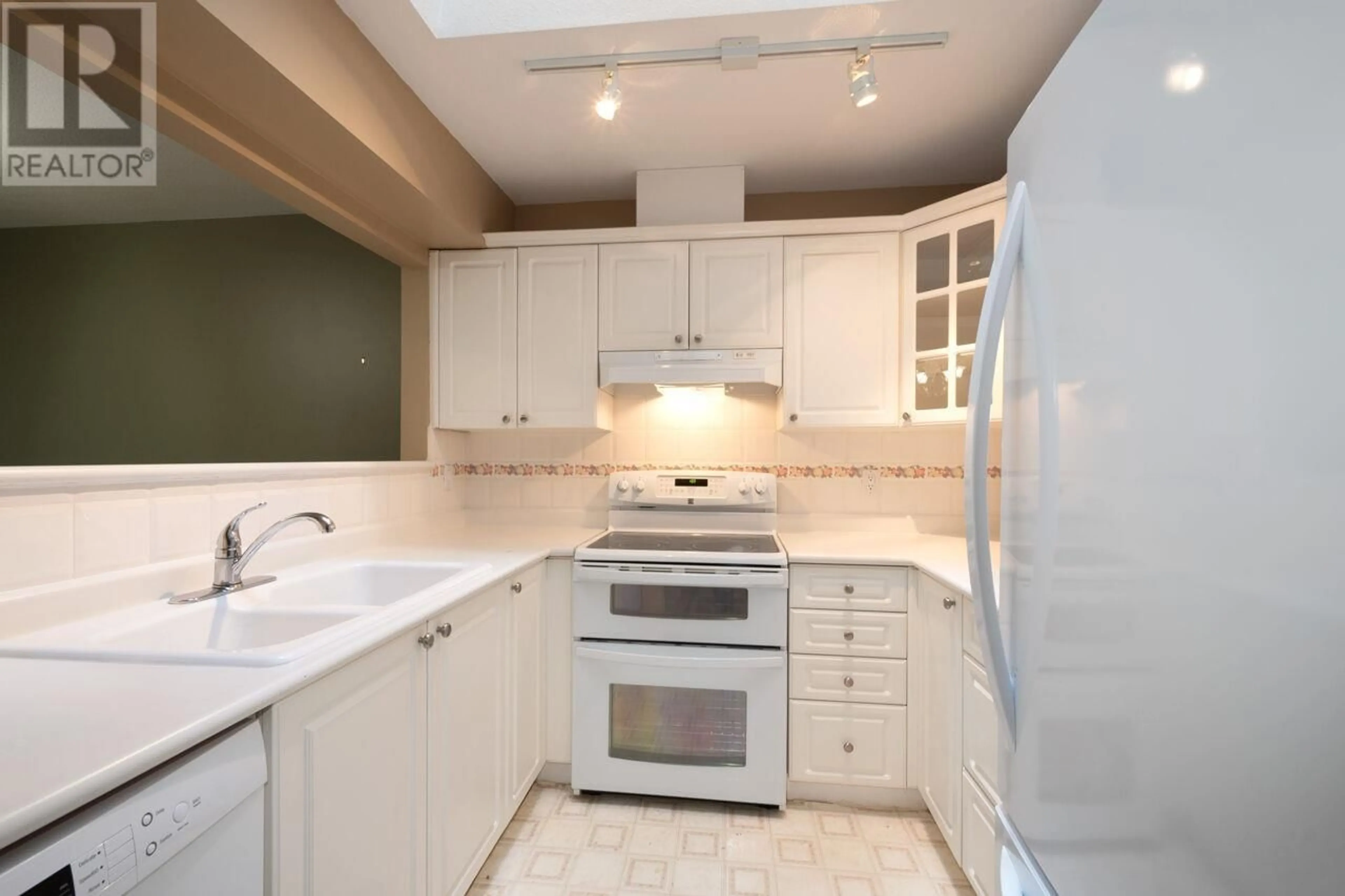 Standard kitchen, ceramic/tile floor for 405 3658 BANFF COURT, North Vancouver British Columbia V7H2Y7