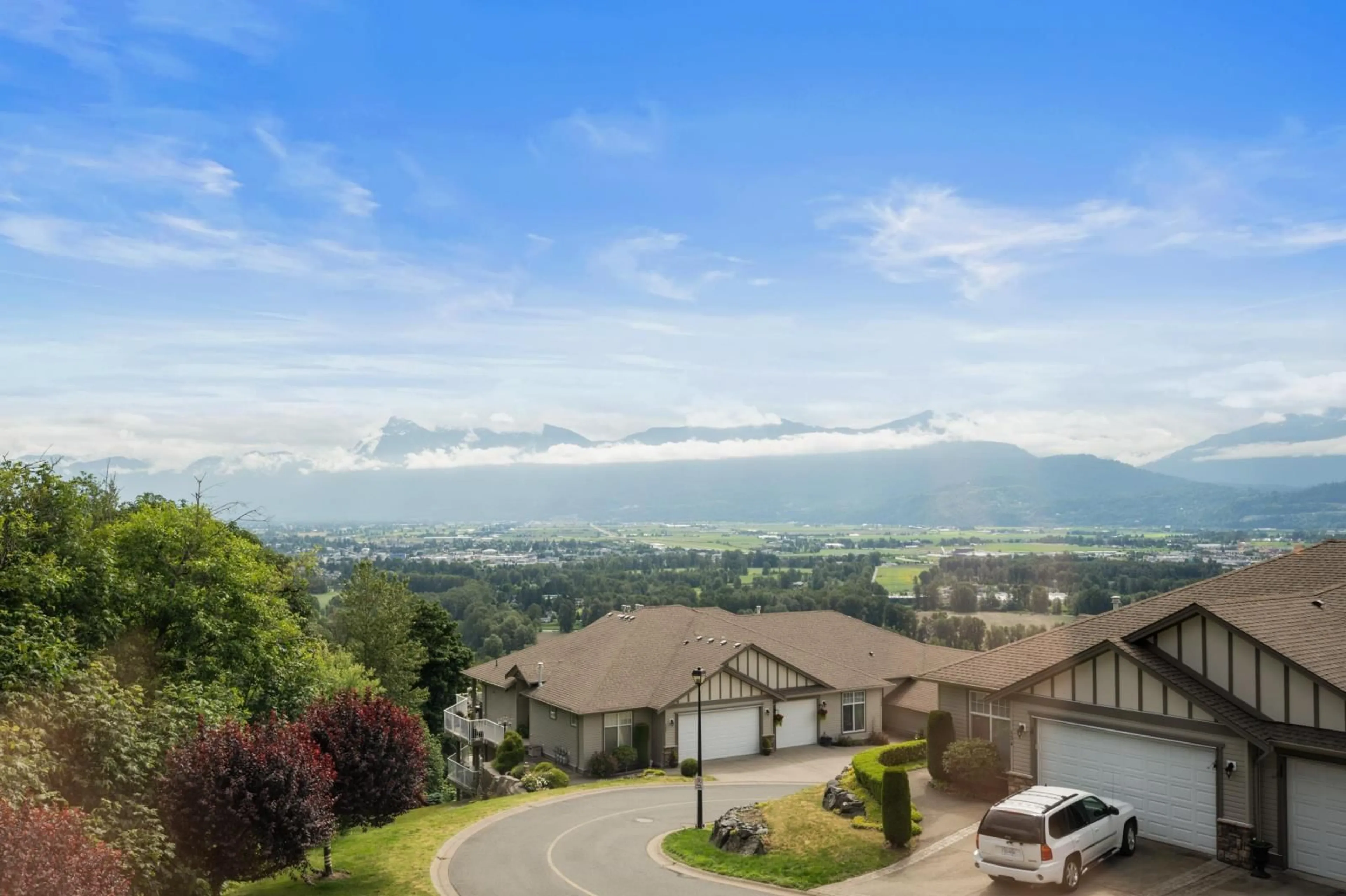 A pic from outside/outdoor area/front of a property/back of a property/a pic from drone, mountain view for 140 8590 SUNRISE DRIVE|Chilliwack Mounta, Chilliwack British Columbia V2R3Z4