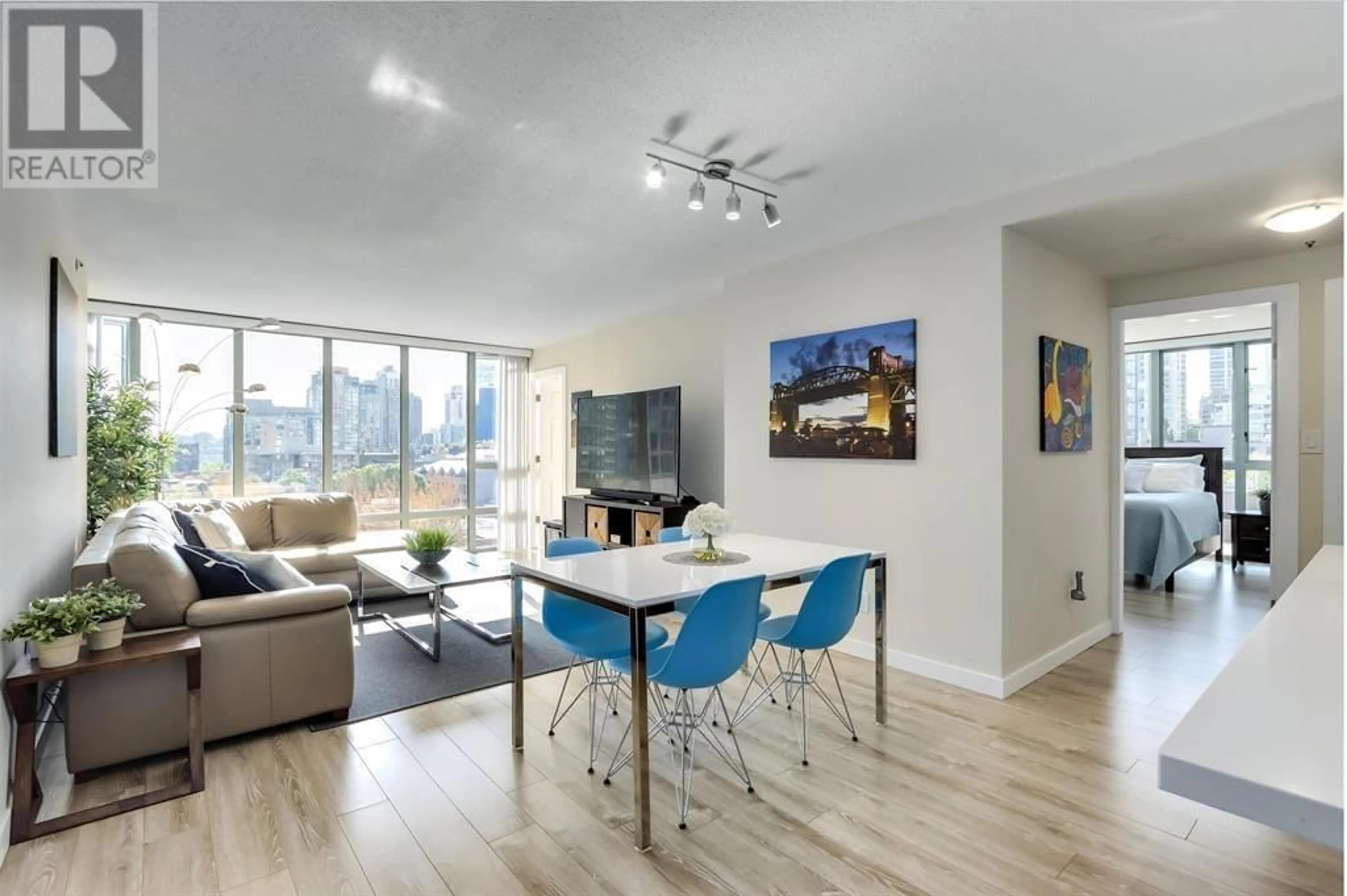 Living room with furniture, wood/laminate floor for 804 950 CAMBIE STREET, Vancouver British Columbia V6B5X5