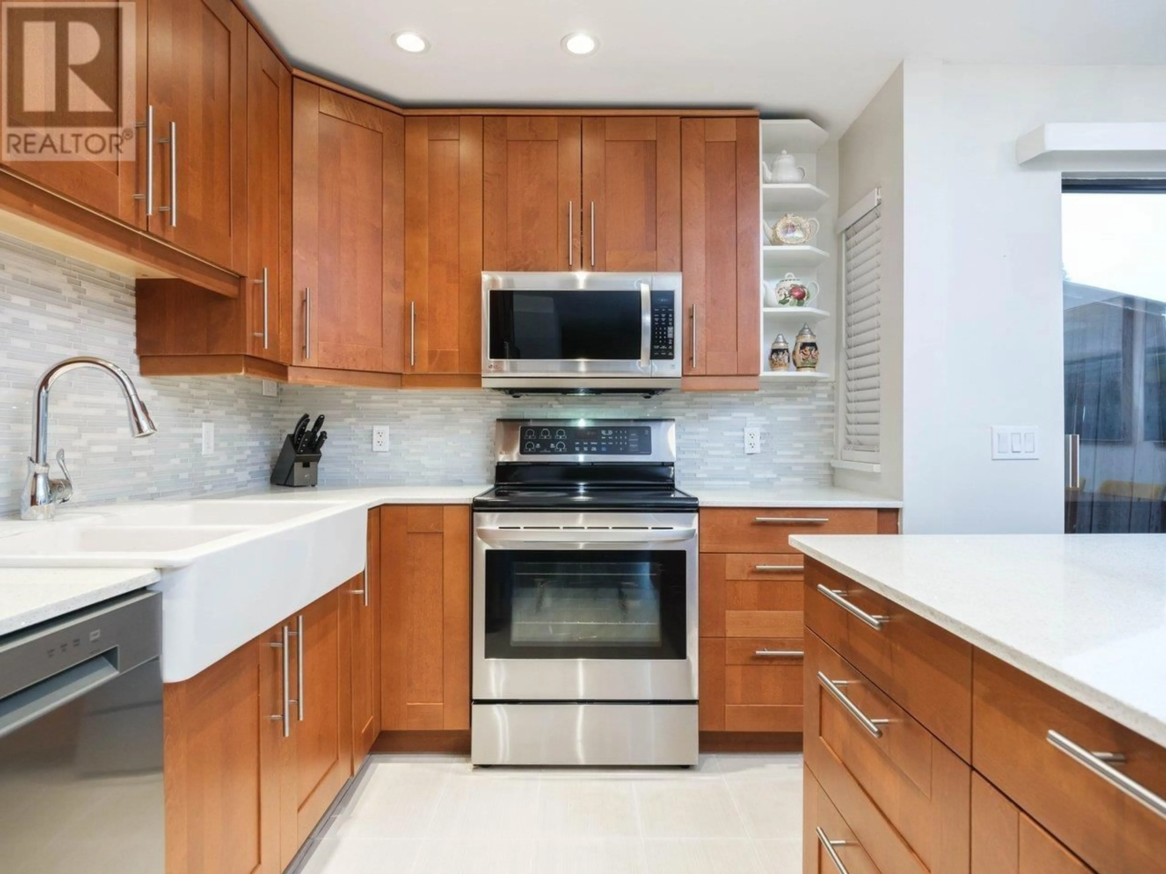 Contemporary kitchen, ceramic/tile floor for 3 266 W 4TH STREET, North Vancouver British Columbia V7M1H7