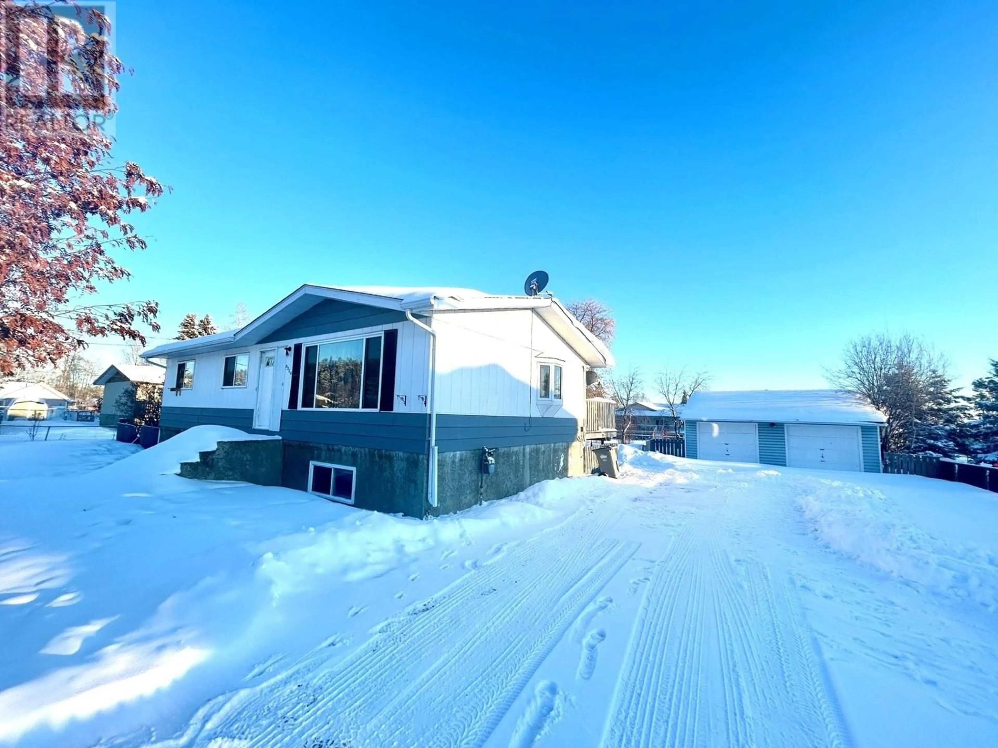 A pic from outside/outdoor area/front of a property/back of a property/a pic from drone, street for 5524 48 STREET, Fort Nelson British Columbia V0C1R0