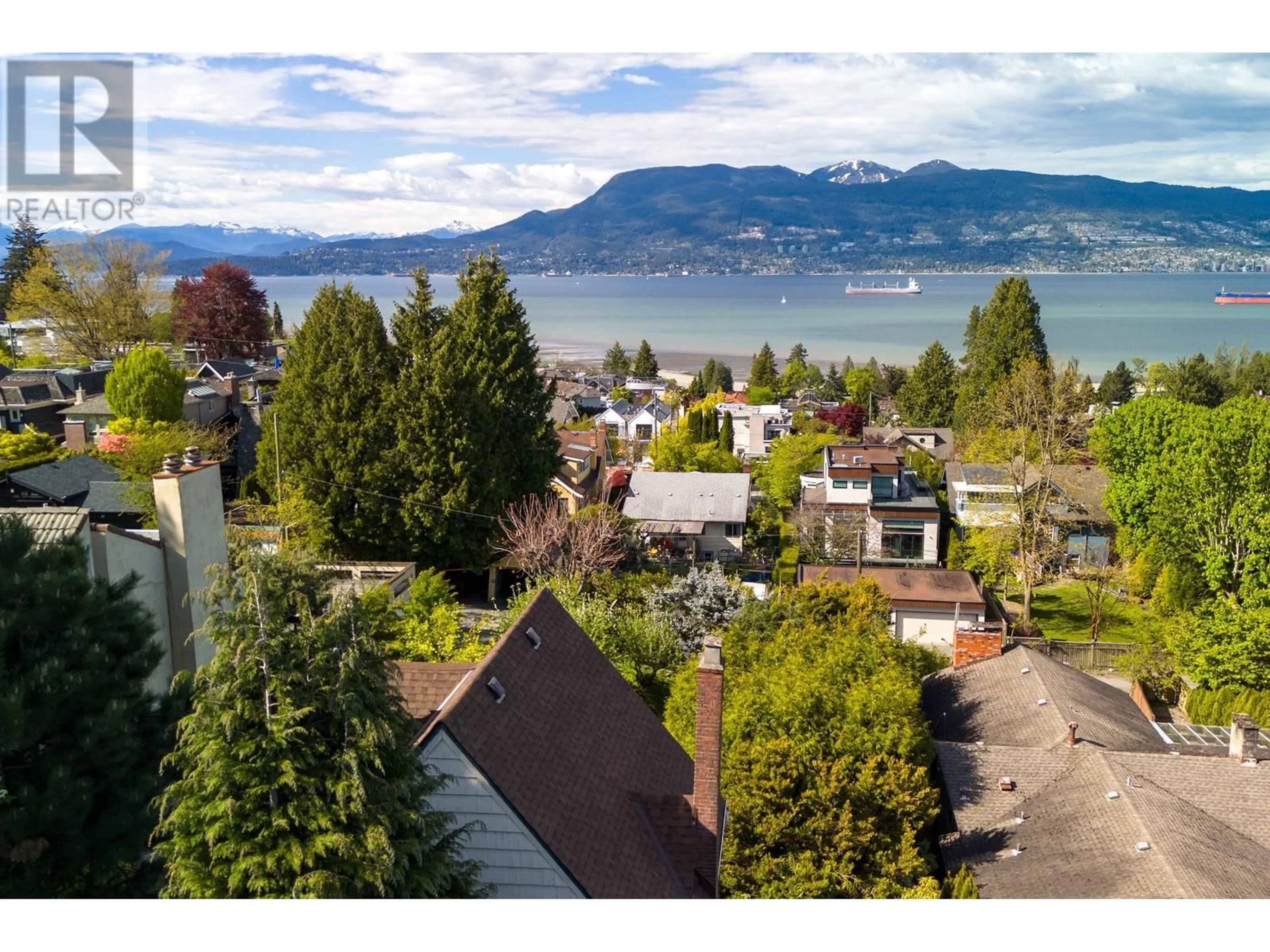 A pic from outside/outdoor area/front of a property/back of a property/a pic from drone, mountain view for 4517 4TH AVENUE, Vancouver British Columbia V6R1R4