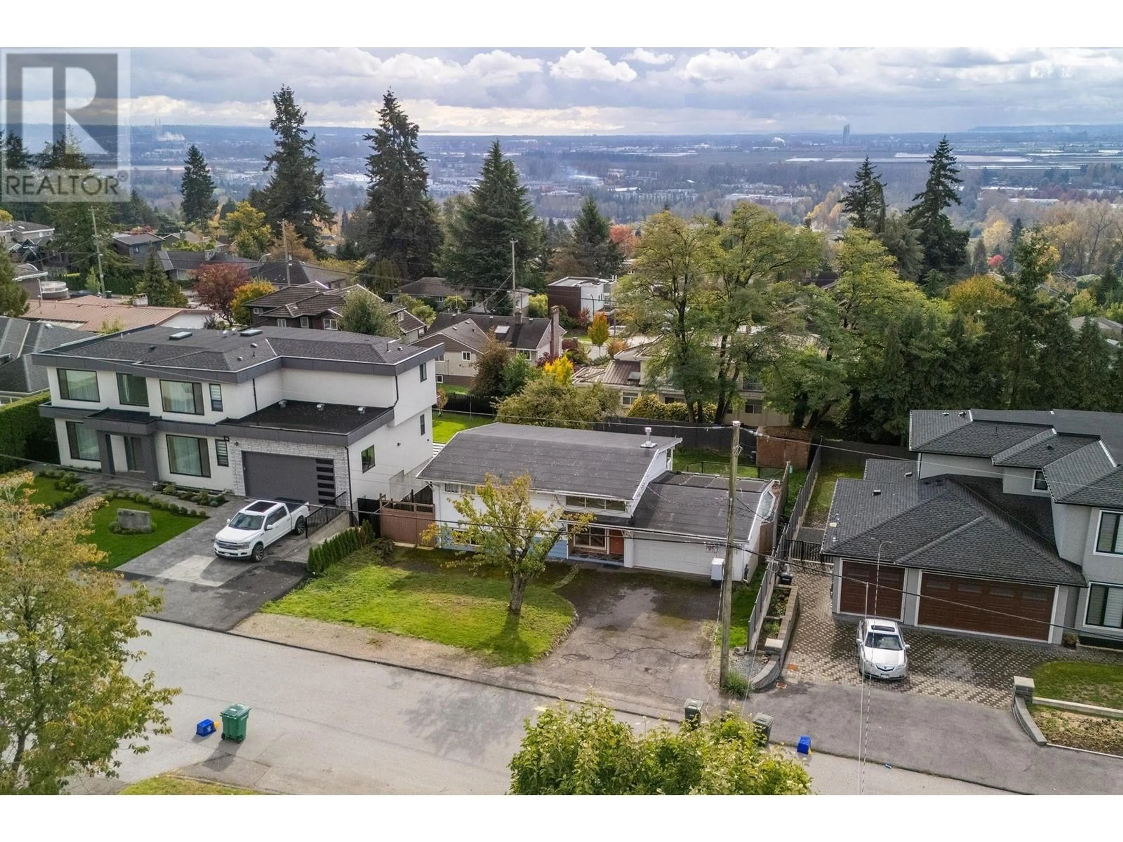 A pic from outside/outdoor area/front of a property/back of a property/a pic from drone, mountain view for 4150 IRMIN STREET, Burnaby British Columbia V5J1X5