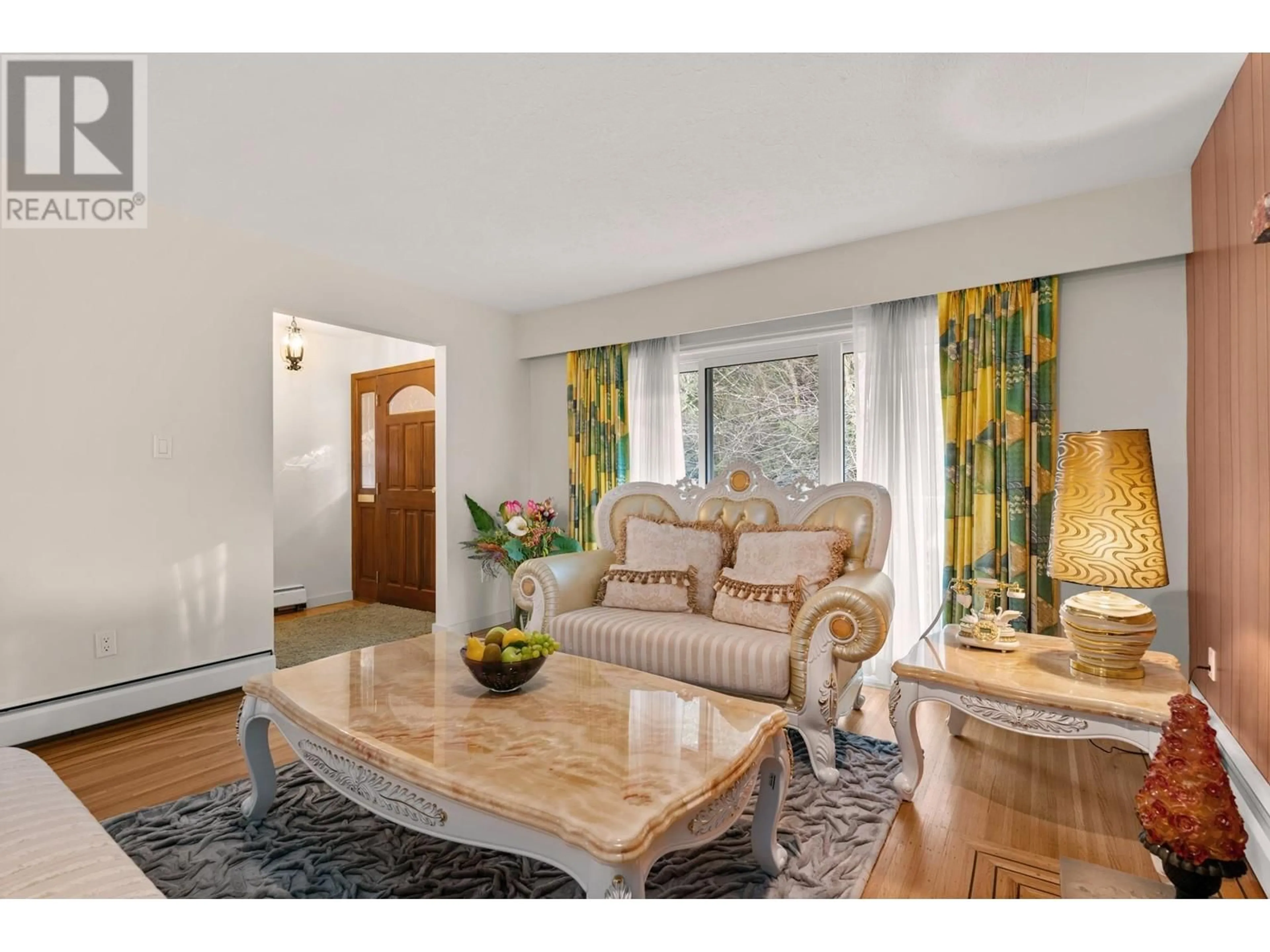 Living room with furniture, wood/laminate floor for 4651 W 16TH AVENUE, Vancouver British Columbia V6R3E9