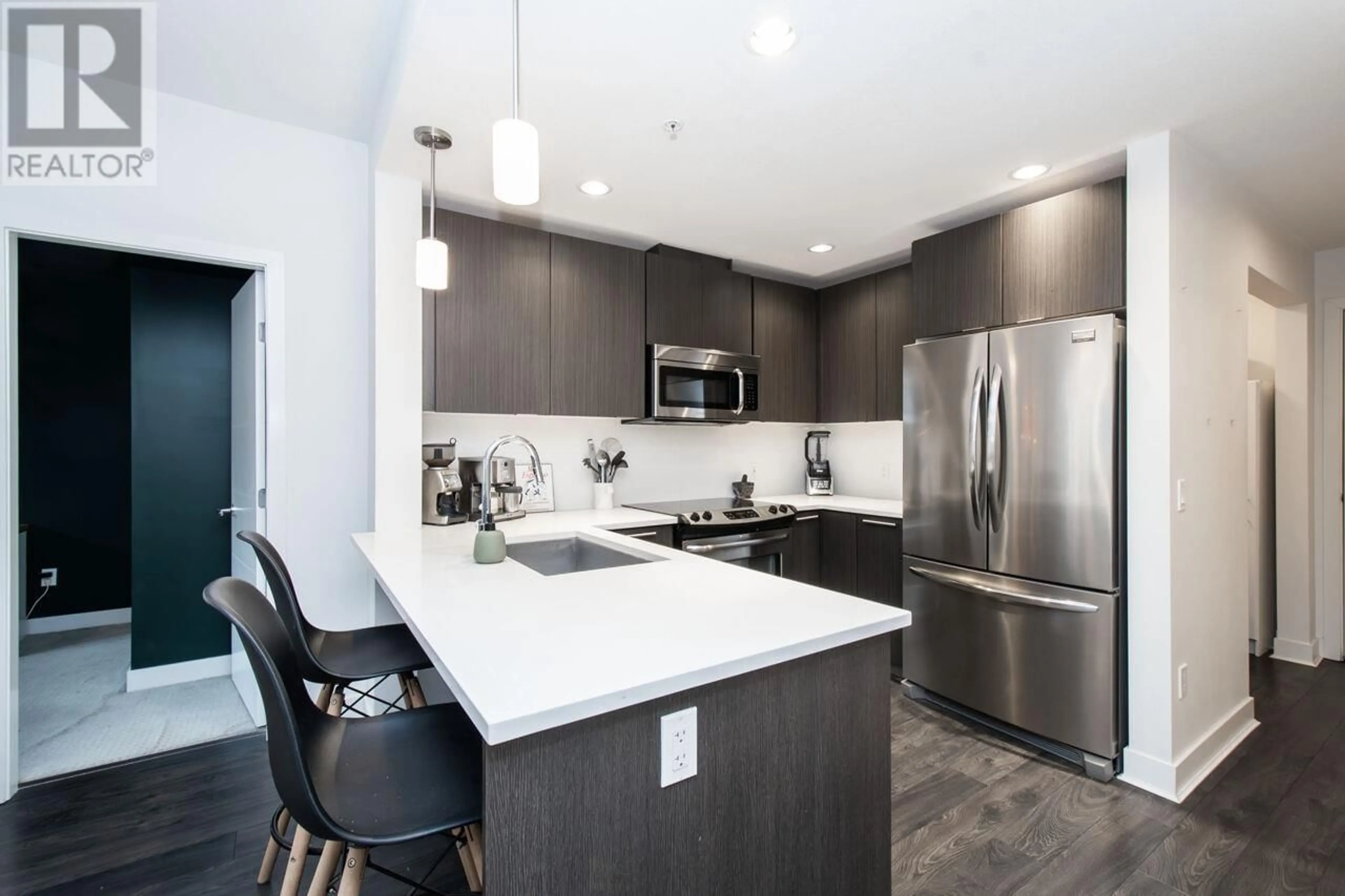 Open concept kitchen, unknown for 409 733 W 3RD STREET, North Vancouver British Columbia V7M0C8