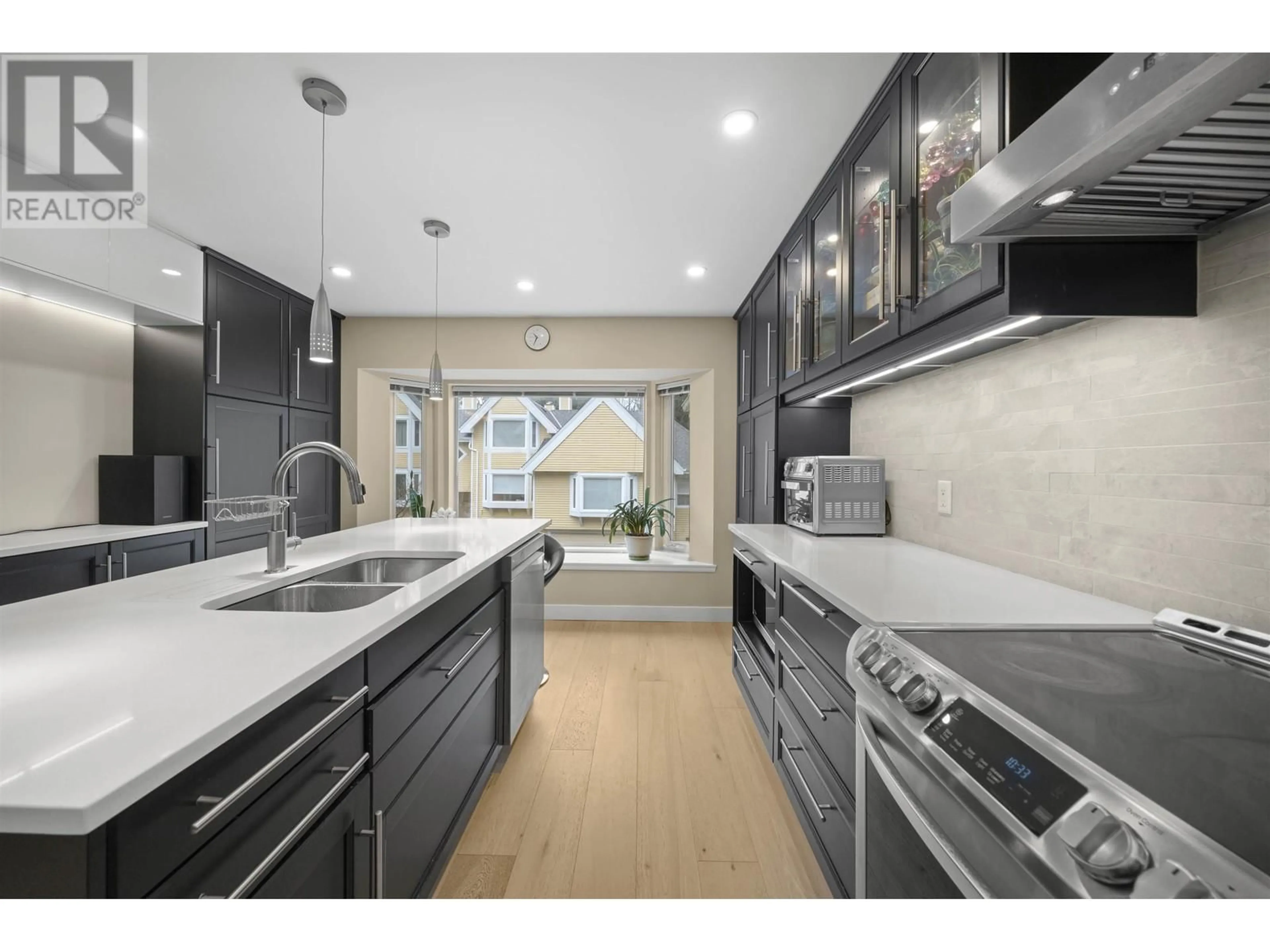 Open concept kitchen, ceramic/tile floor for 3312 FLAGSTAFF PLACE, Vancouver British Columbia V5S4K8