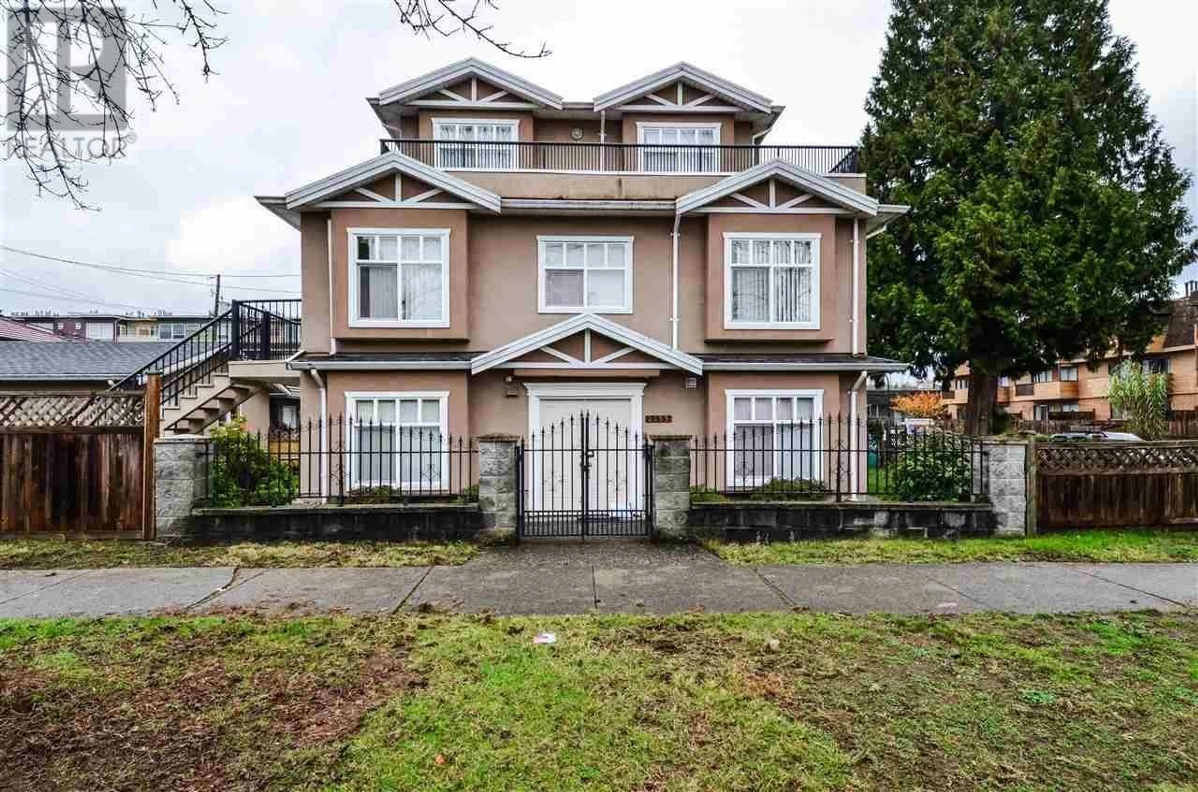 Home with vinyl exterior material, street for 2255 E 30TH AVENUE, Vancouver British Columbia V5N3A8