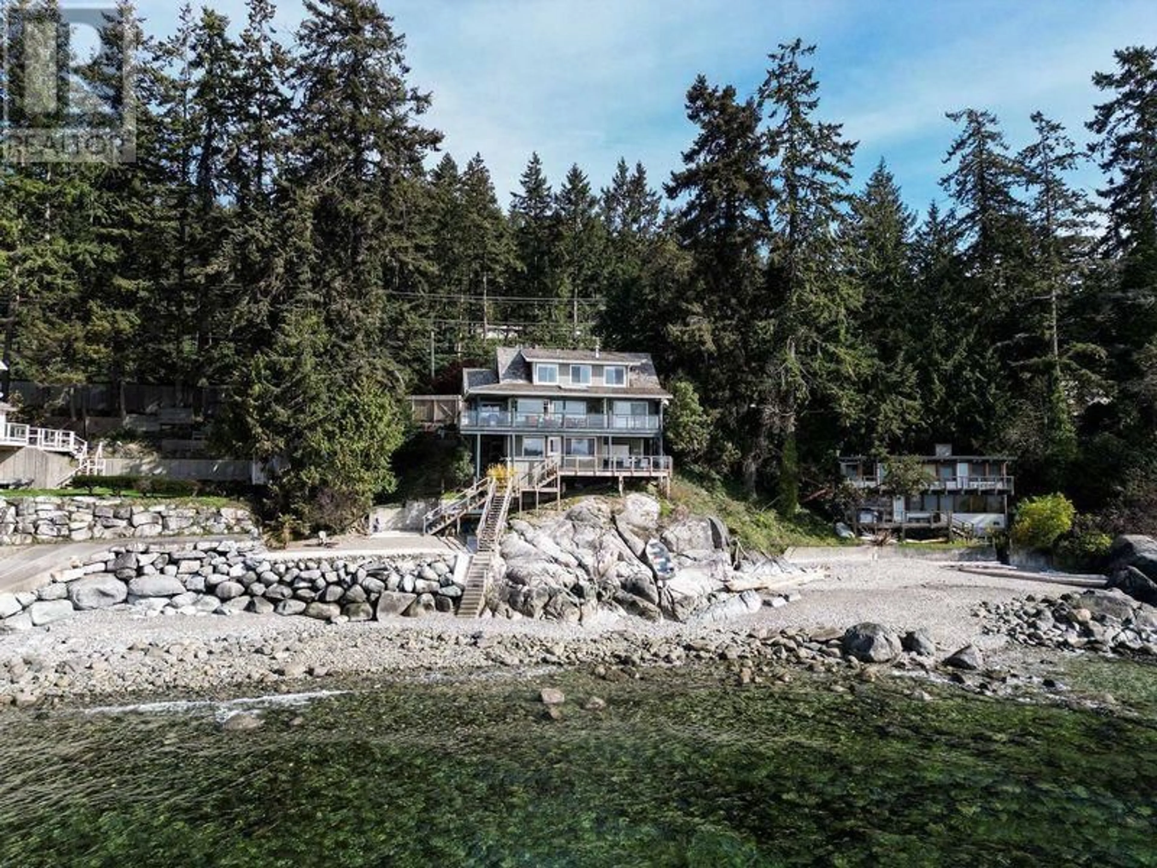 A pic from outside/outdoor area/front of a property/back of a property/a pic from drone, water/lake/river/ocean view for 6643 SUNSHINE COAST HIGHWAY, Sechelt British Columbia V7Z0M9