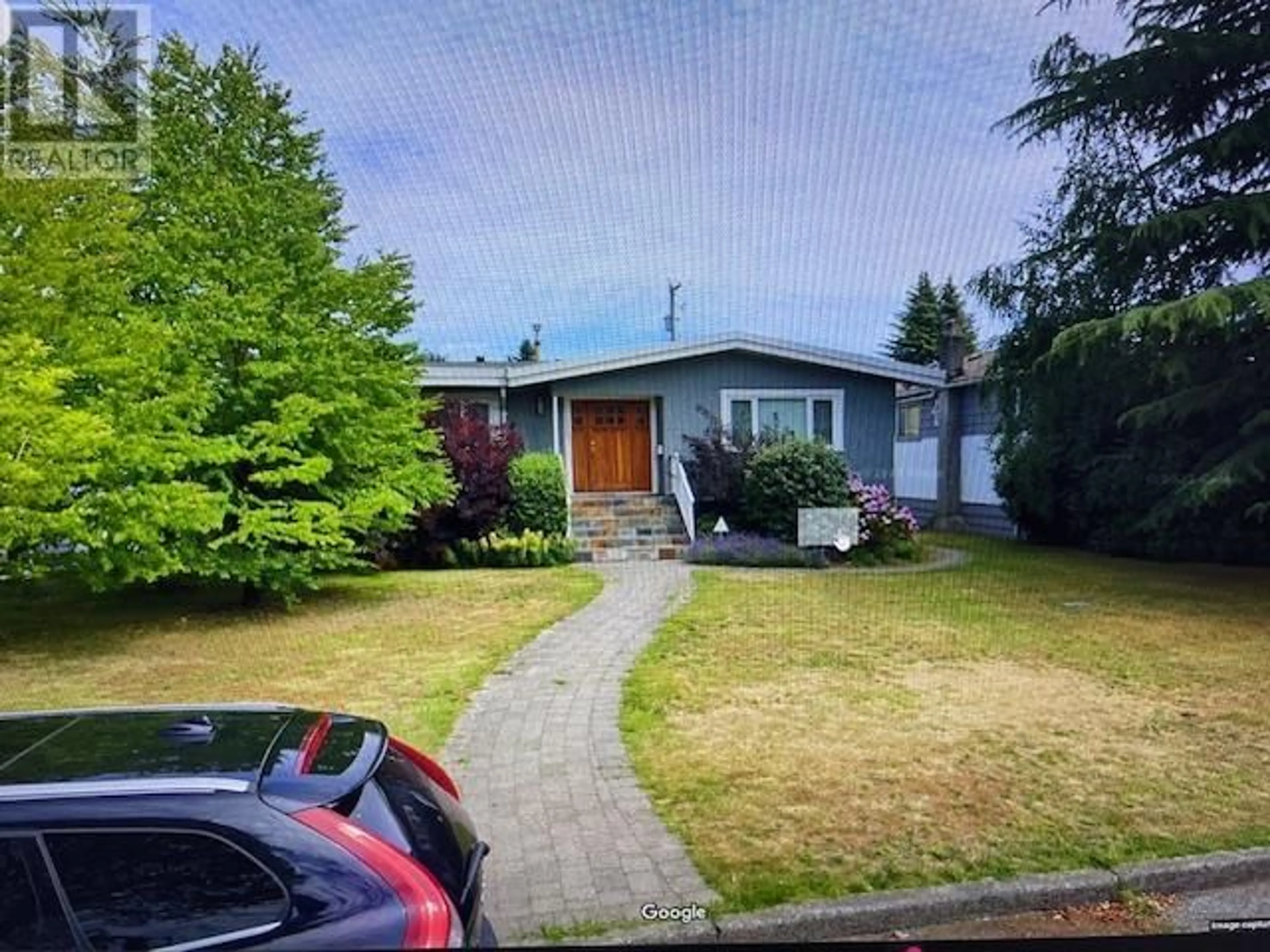 A pic from outside/outdoor area/front of a property/back of a property/a pic from drone, street for 5570 BAILLIE STREET, Vancouver British Columbia V5Z3M8