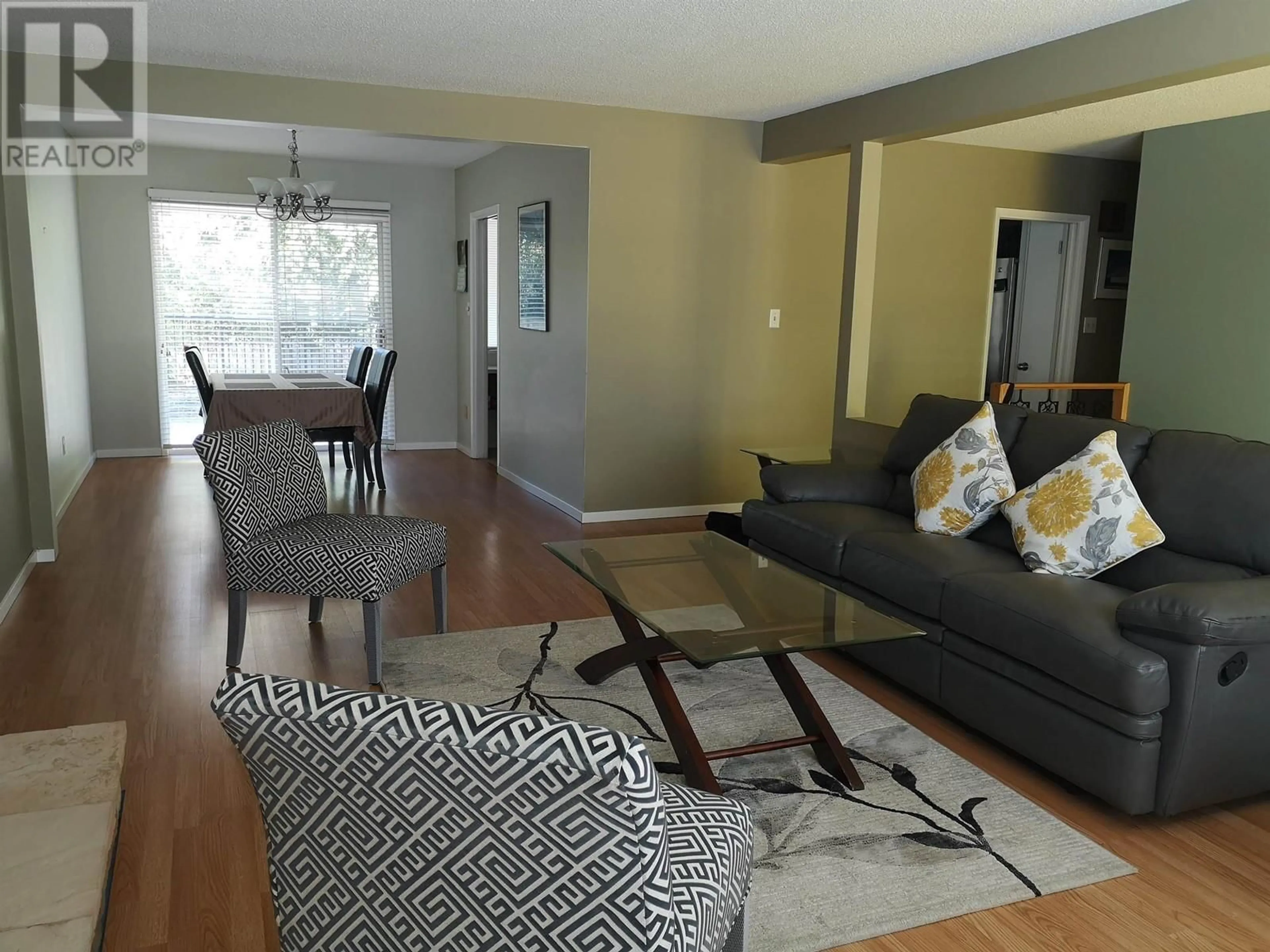 Living room with furniture, wood/laminate floor for 3513 STEVENSON STREET, Port Coquitlam British Columbia V3B4M5