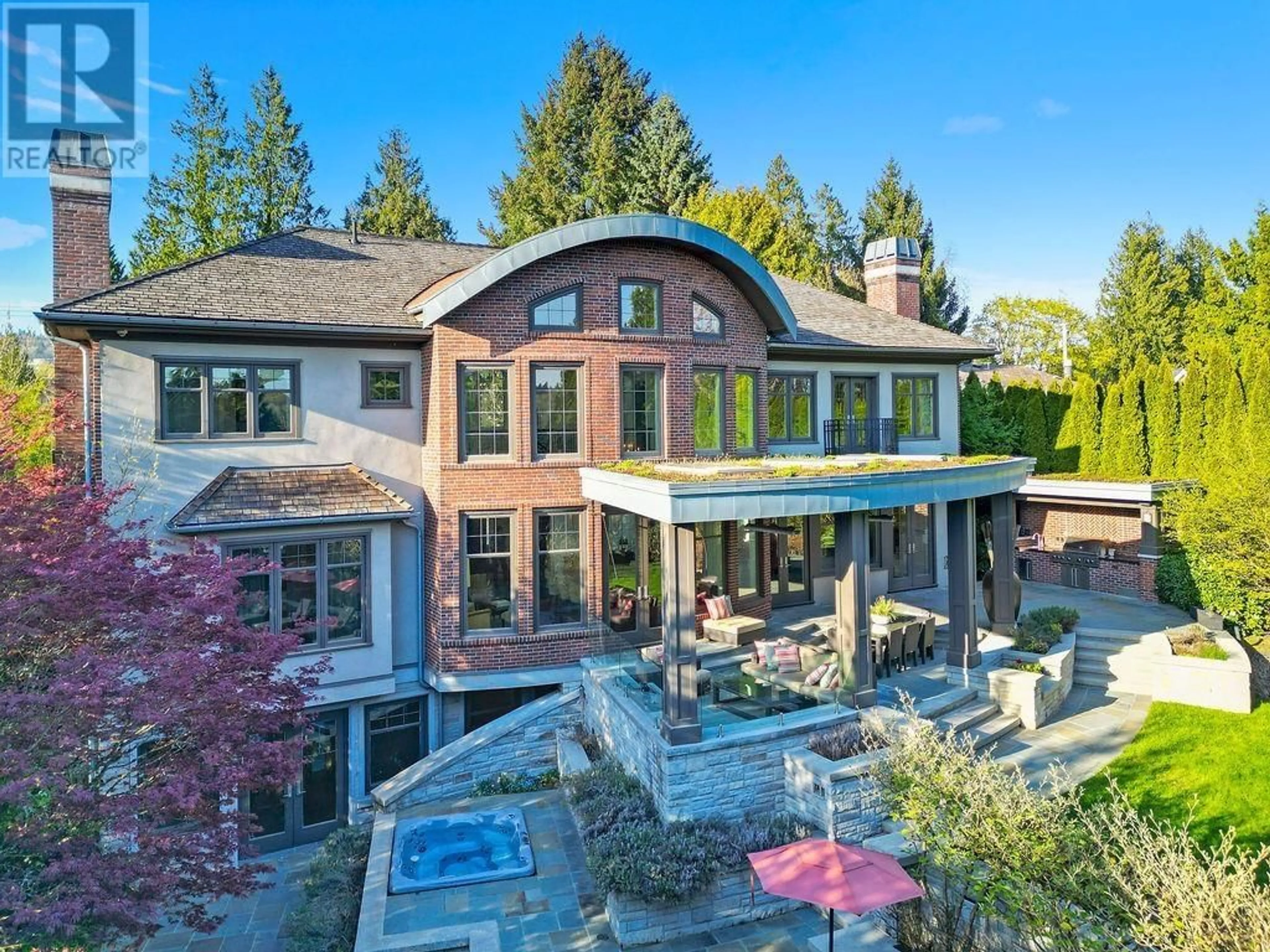 A pic from outside/outdoor area/front of a property/back of a property/a pic from drone, mountain view for 8112 GOVERNMENT ROAD, Burnaby British Columbia V5A2E2