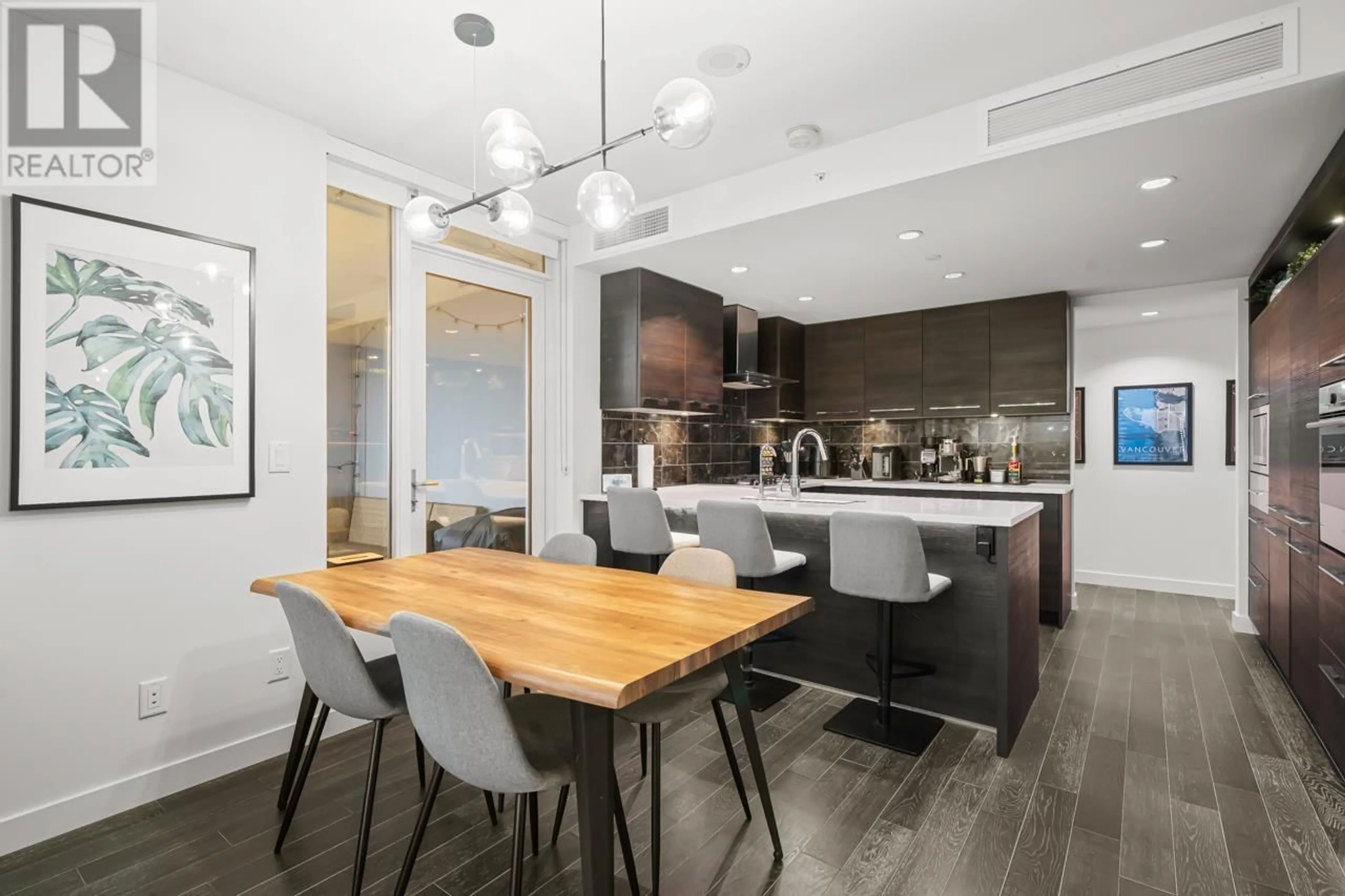 Open concept kitchen, wood/laminate floor for 1610 7488 LANSDOWNE ROAD, Richmond British Columbia V7C0B9