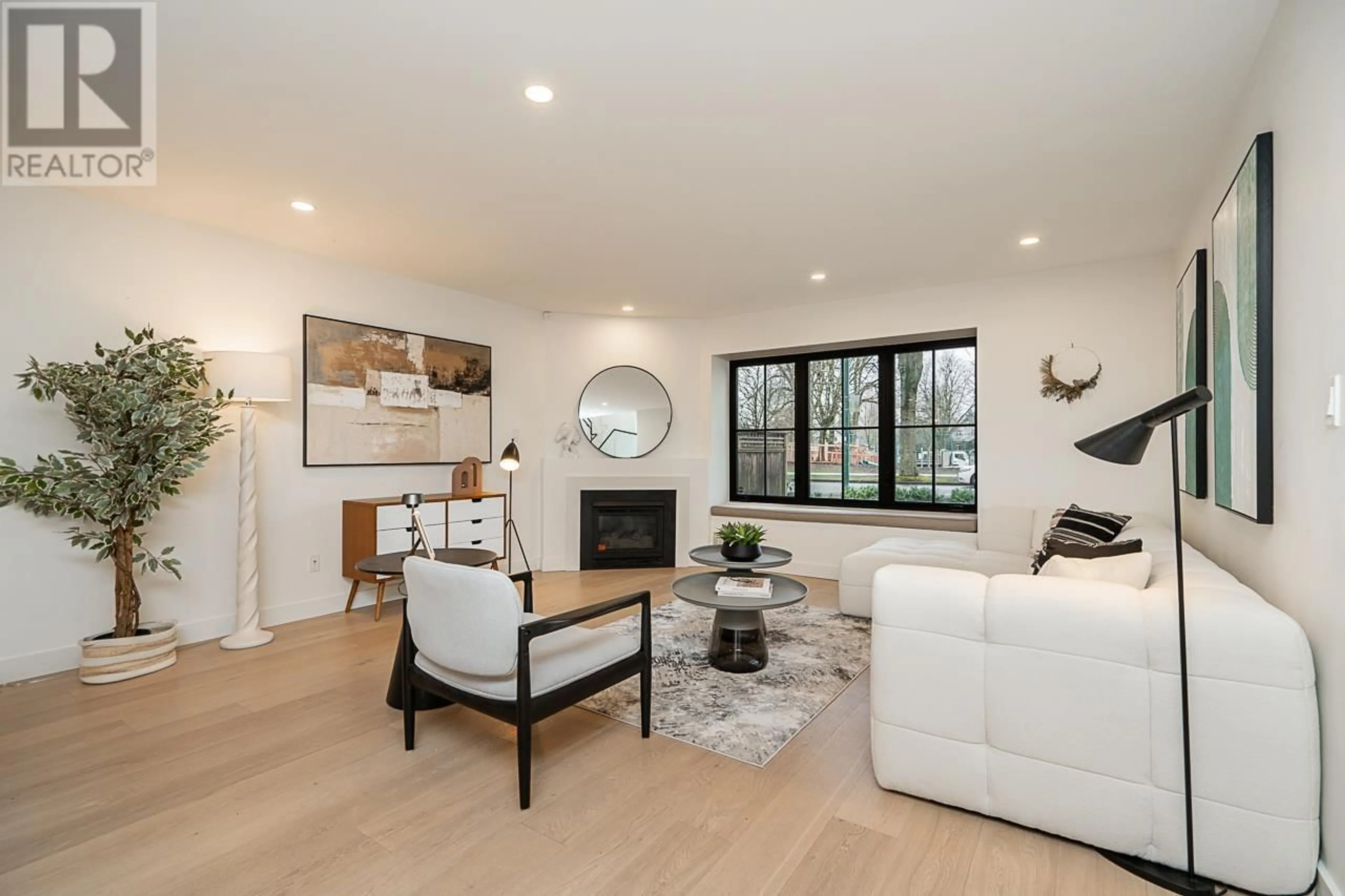 Living room with furniture, wood/laminate floor for 788 W 19TH AVENUE, Vancouver British Columbia V5Z1X2