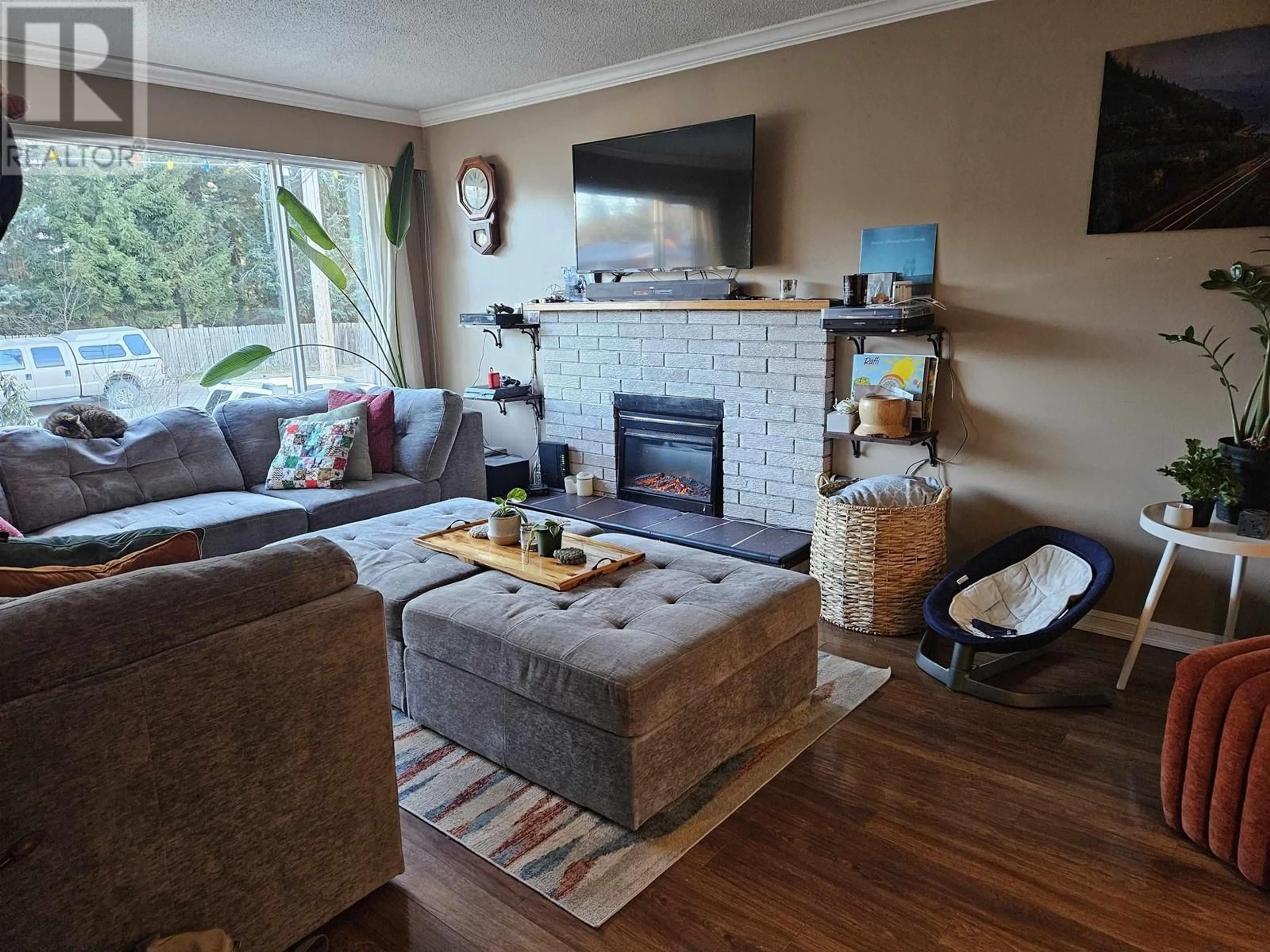 Living room with furniture, wood/laminate floor for 3309 THOMAS STREET, Terrace British Columbia V8G3G4