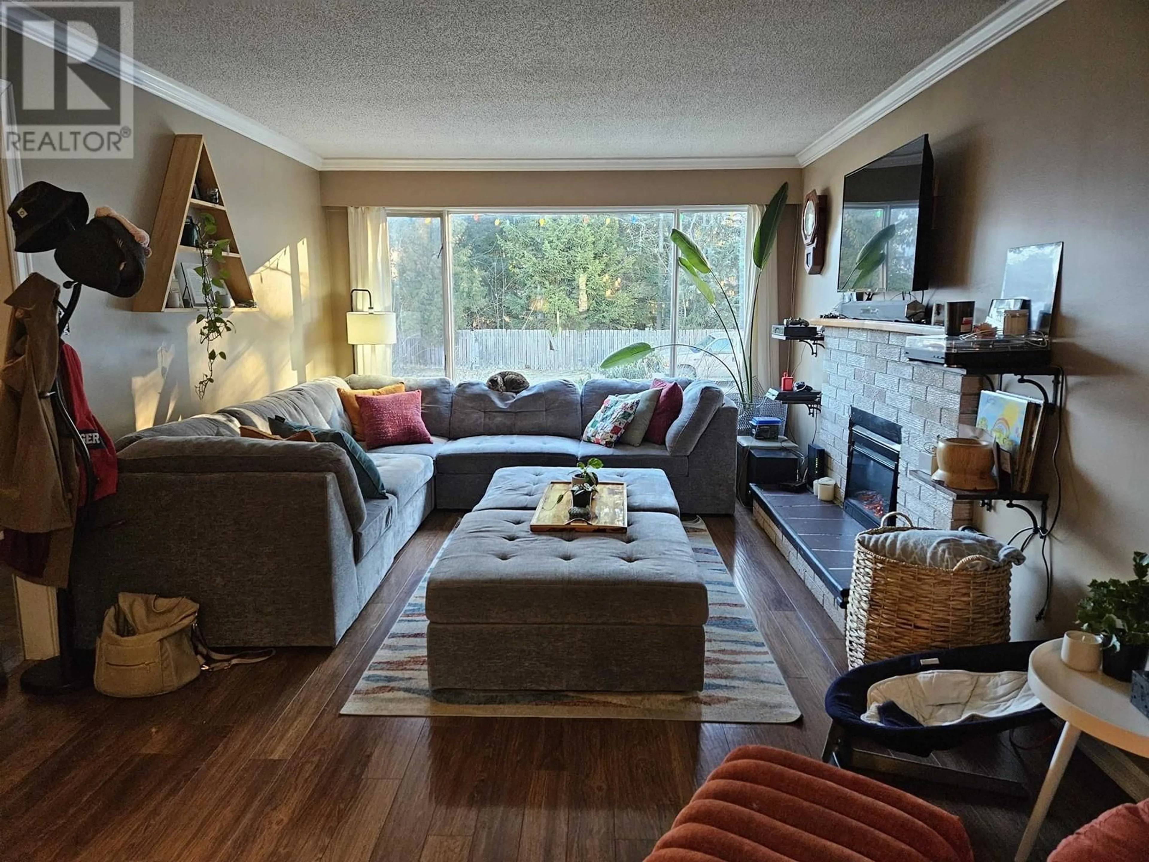 Living room with furniture, wood/laminate floor for 3309 THOMAS STREET, Terrace British Columbia V8G3G4