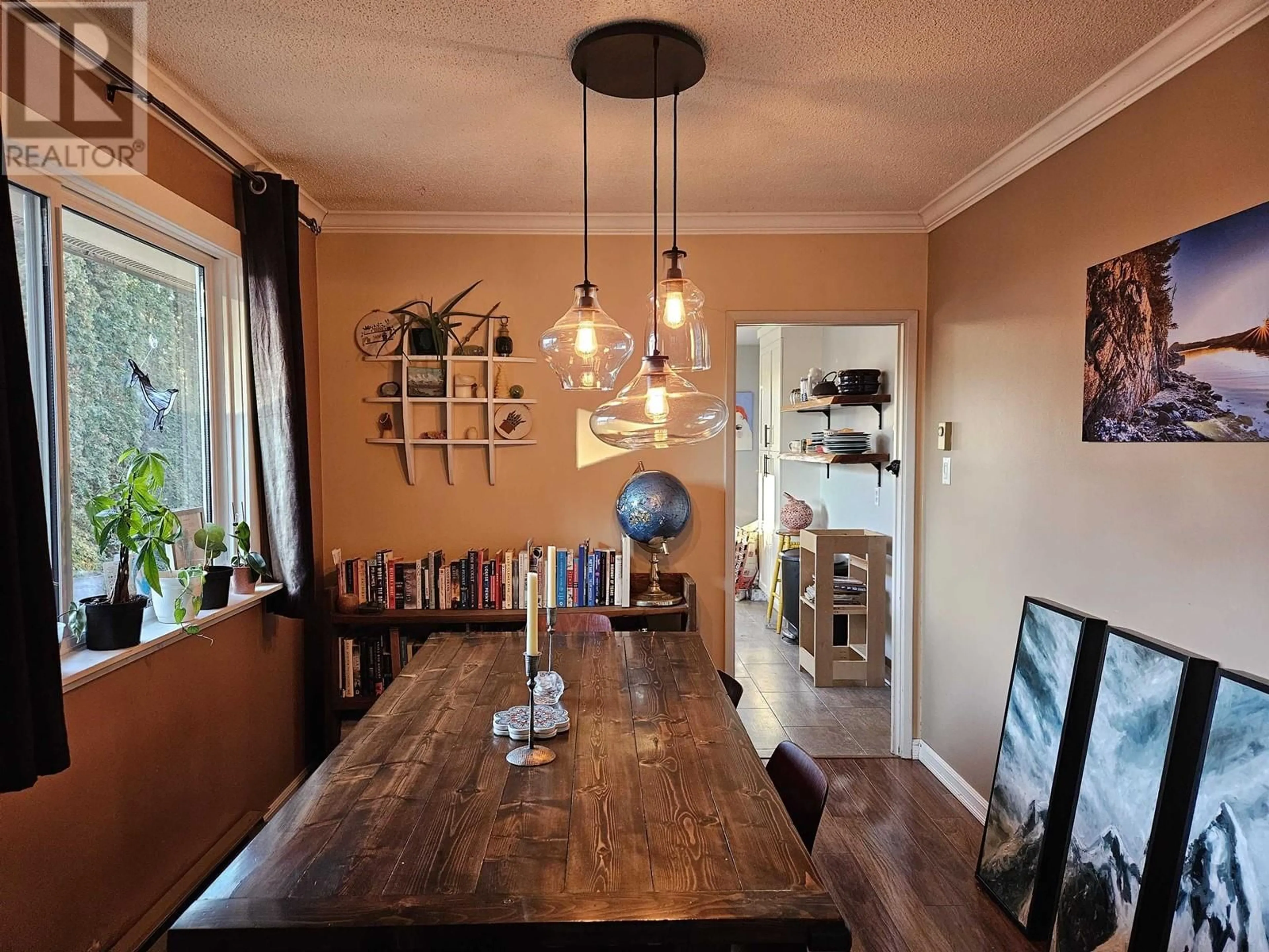 Dining room, wood/laminate floor for 3309 THOMAS STREET, Terrace British Columbia V8G3G4