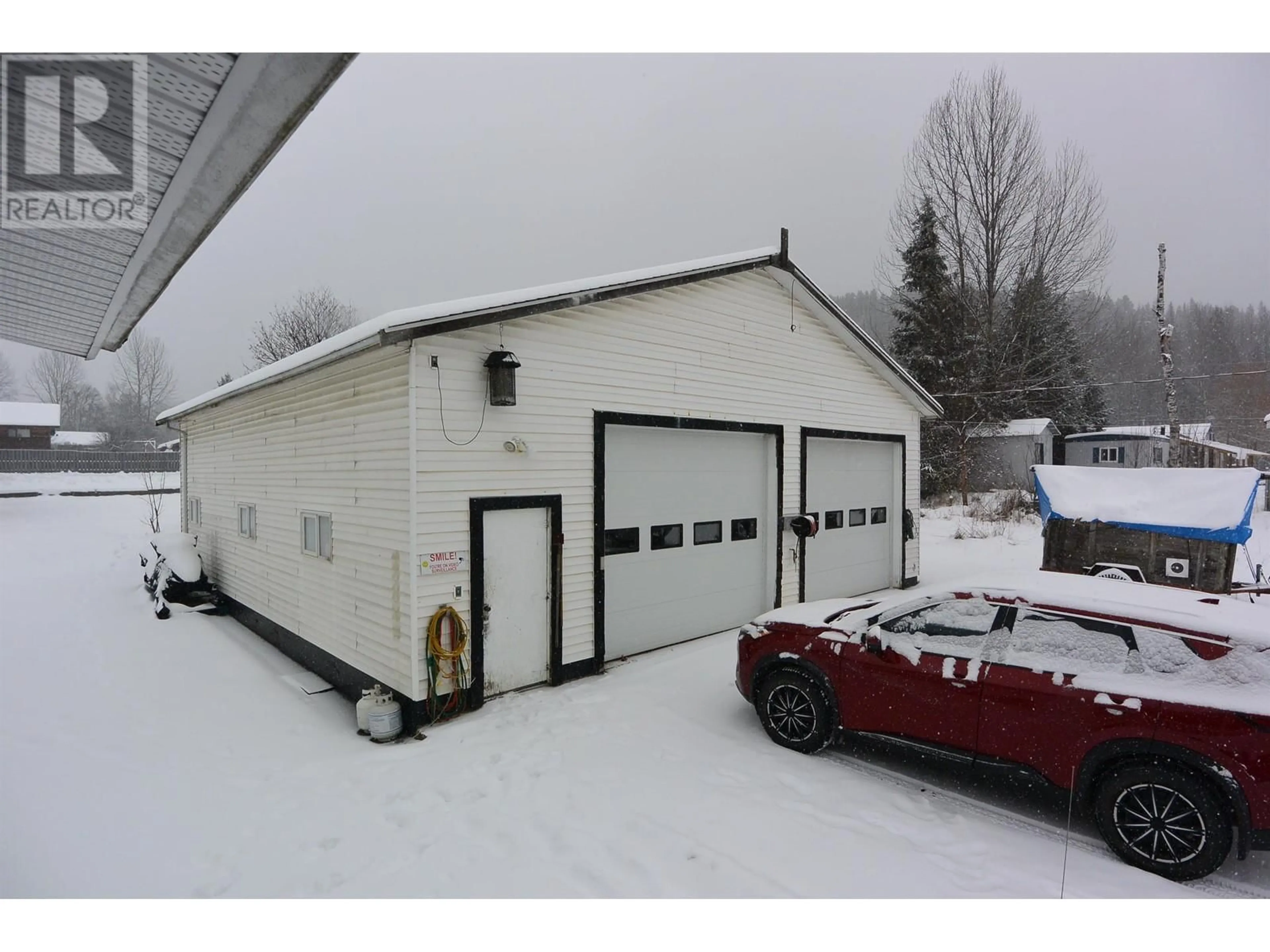 A pic from outside/outdoor area/front of a property/back of a property/a pic from drone, mountain view for 4522 13TH AVENUE, New Hazelton British Columbia V0J2J0