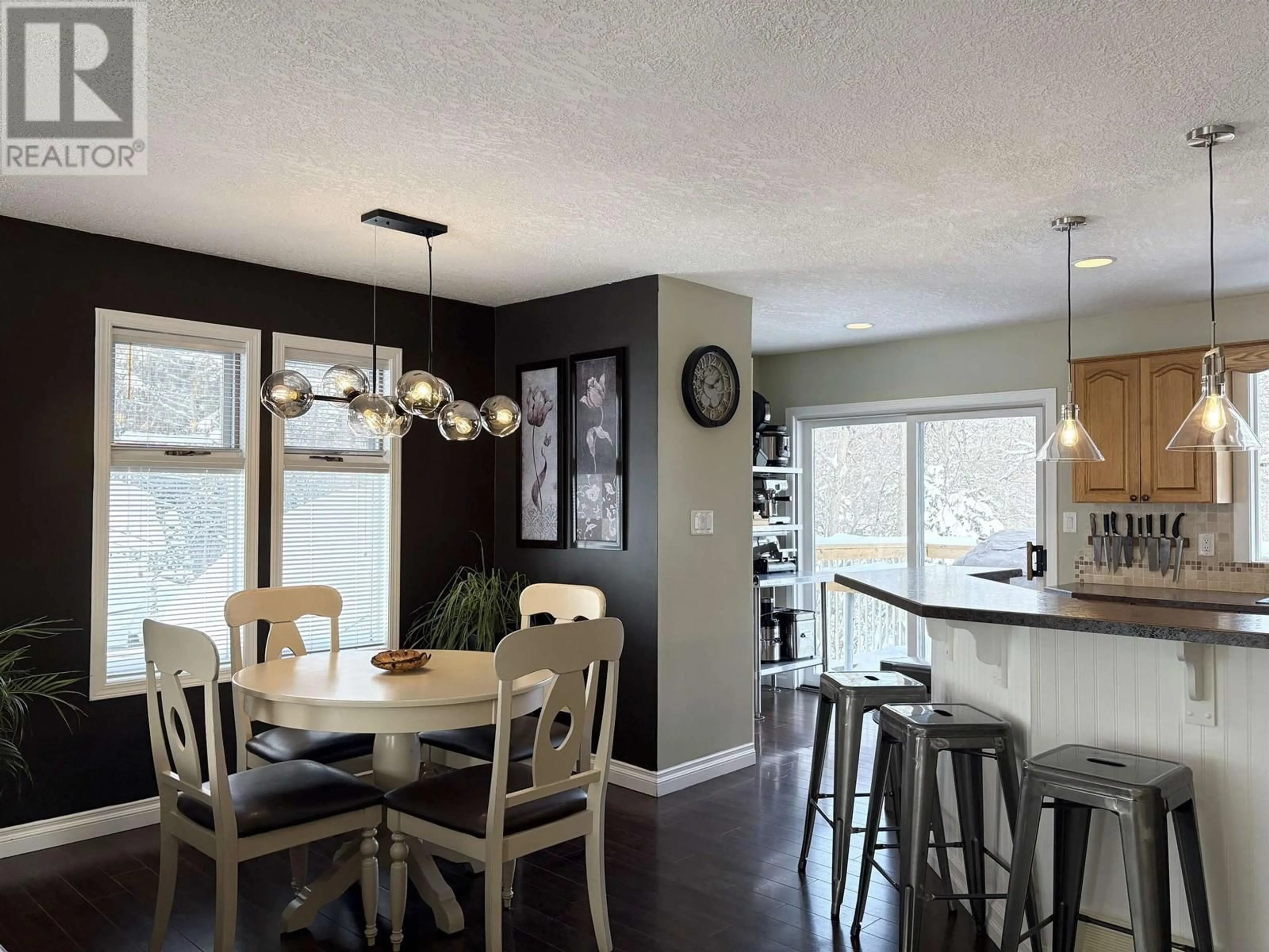 Open concept kitchen, wood/laminate floor for 3182 WALLACE CRESCENT, Prince George British Columbia V2K3R6