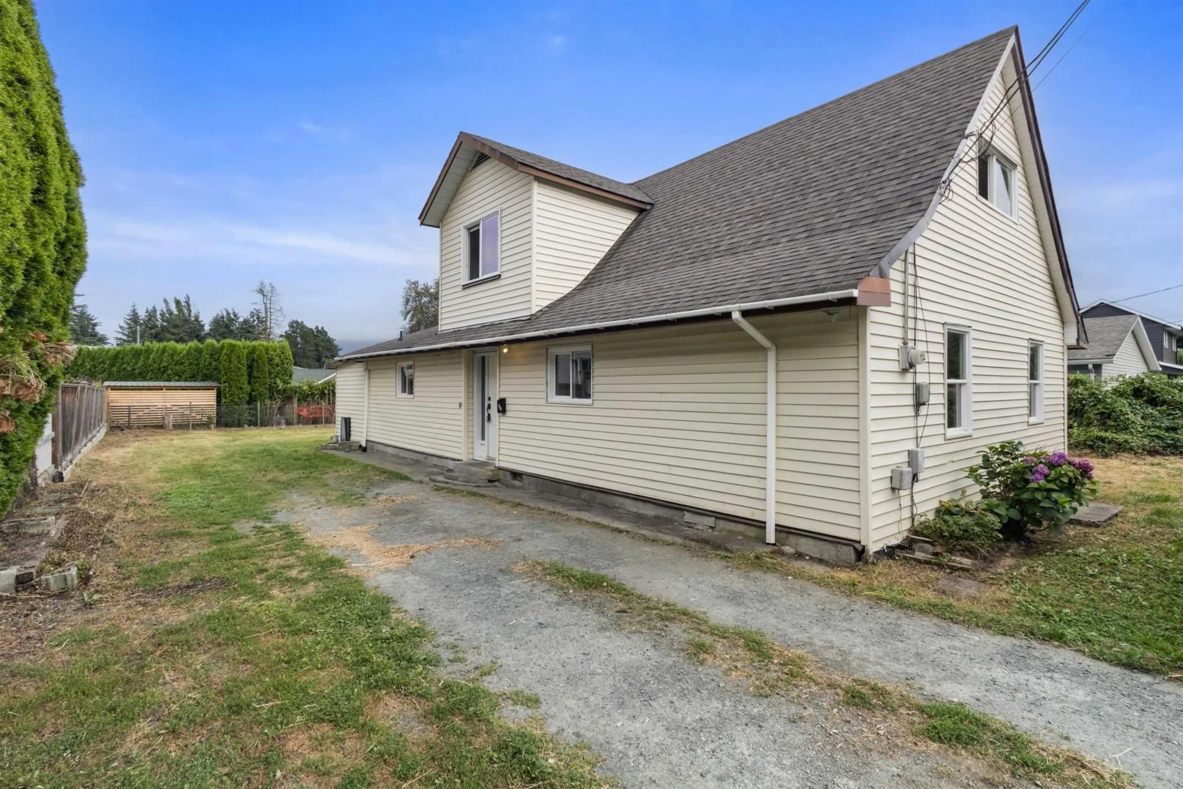 A pic from outside/outdoor area/front of a property/back of a property/a pic from drone, street for 9112 BROADWAY ROAD, Chilliwack British Columbia V2P5W3