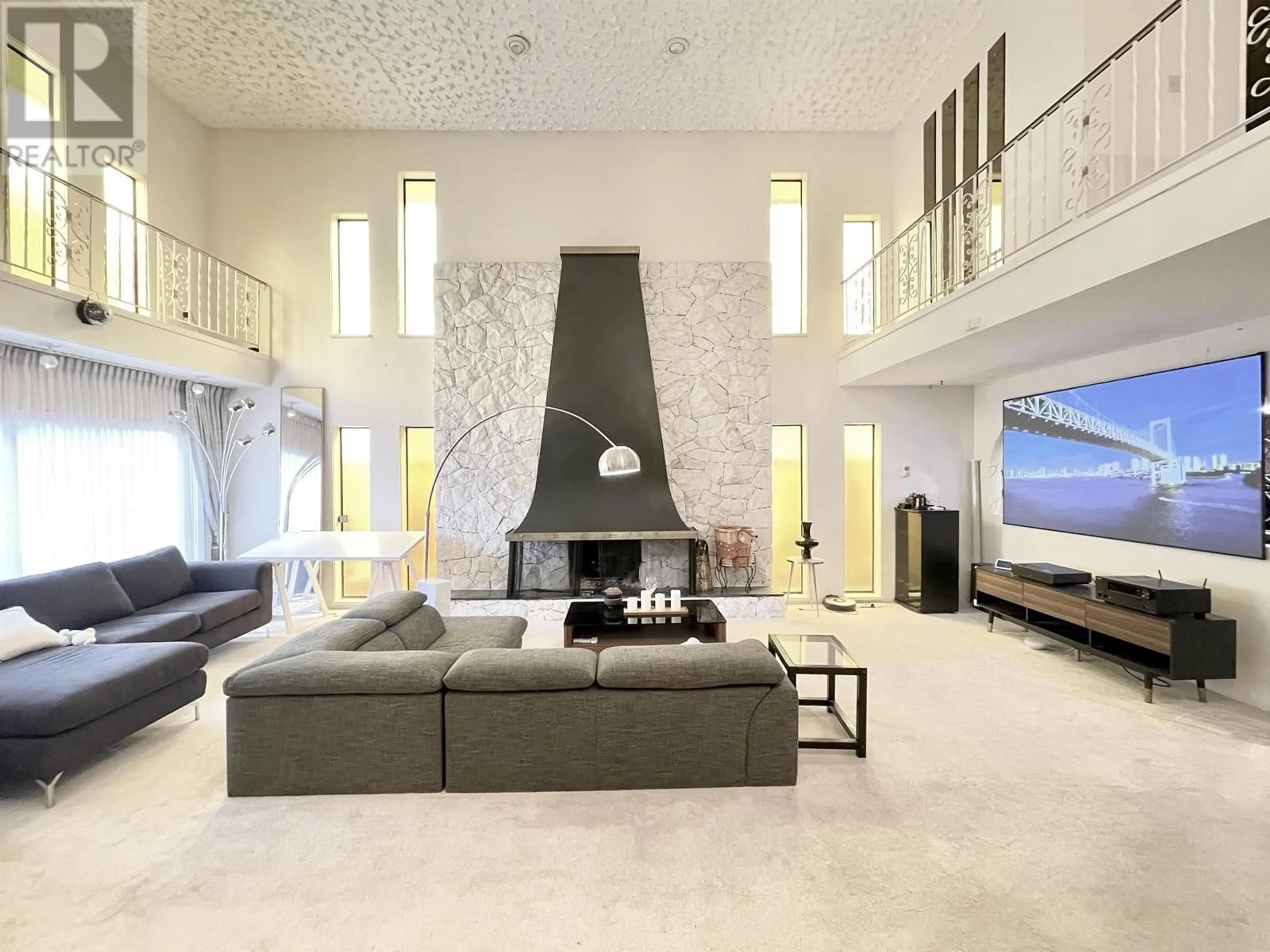 Living room with furniture, ceramic/tile floor for 10260 REYNOLDS PLACE, Richmond British Columbia V7E4B5