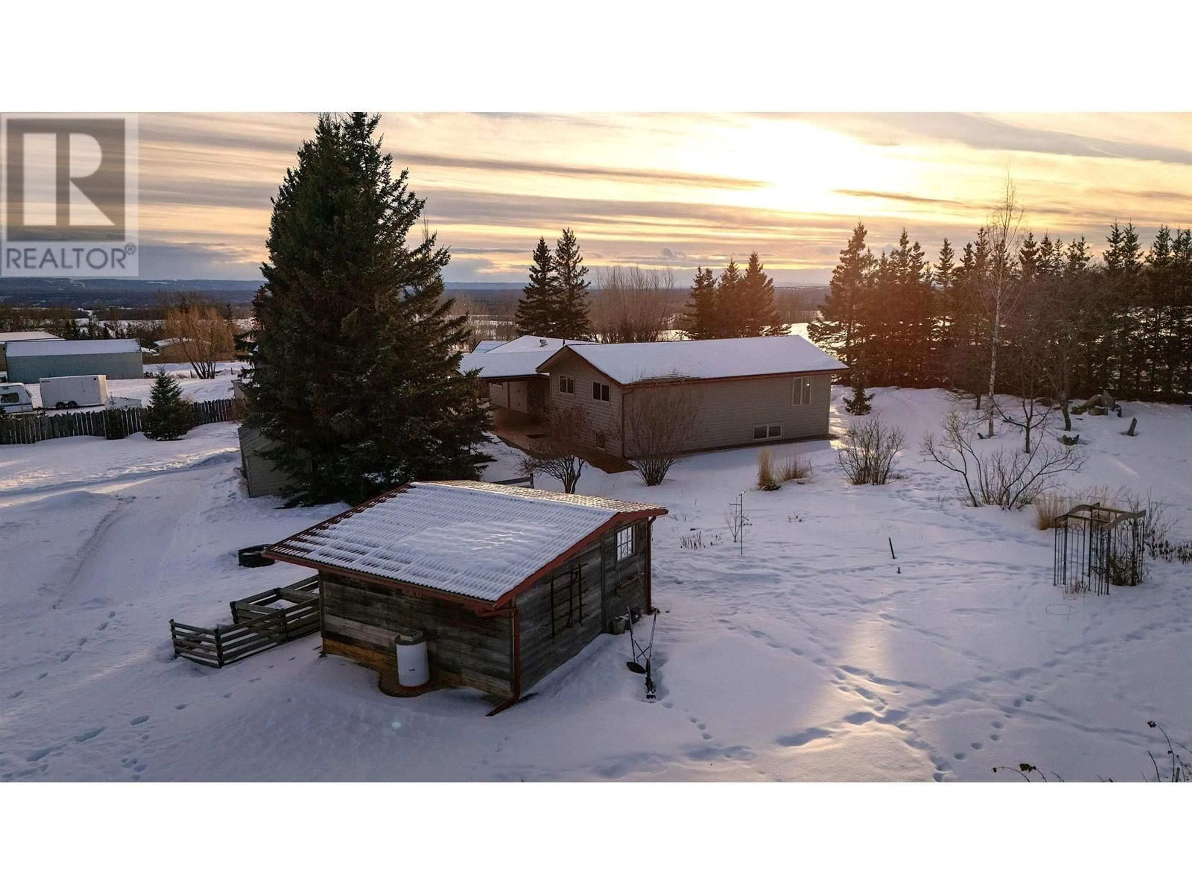 A pic from outside/outdoor area/front of a property/back of a property/a pic from drone, mountain view for 10381 271 ROAD, Fort St. John British Columbia V1J8A7