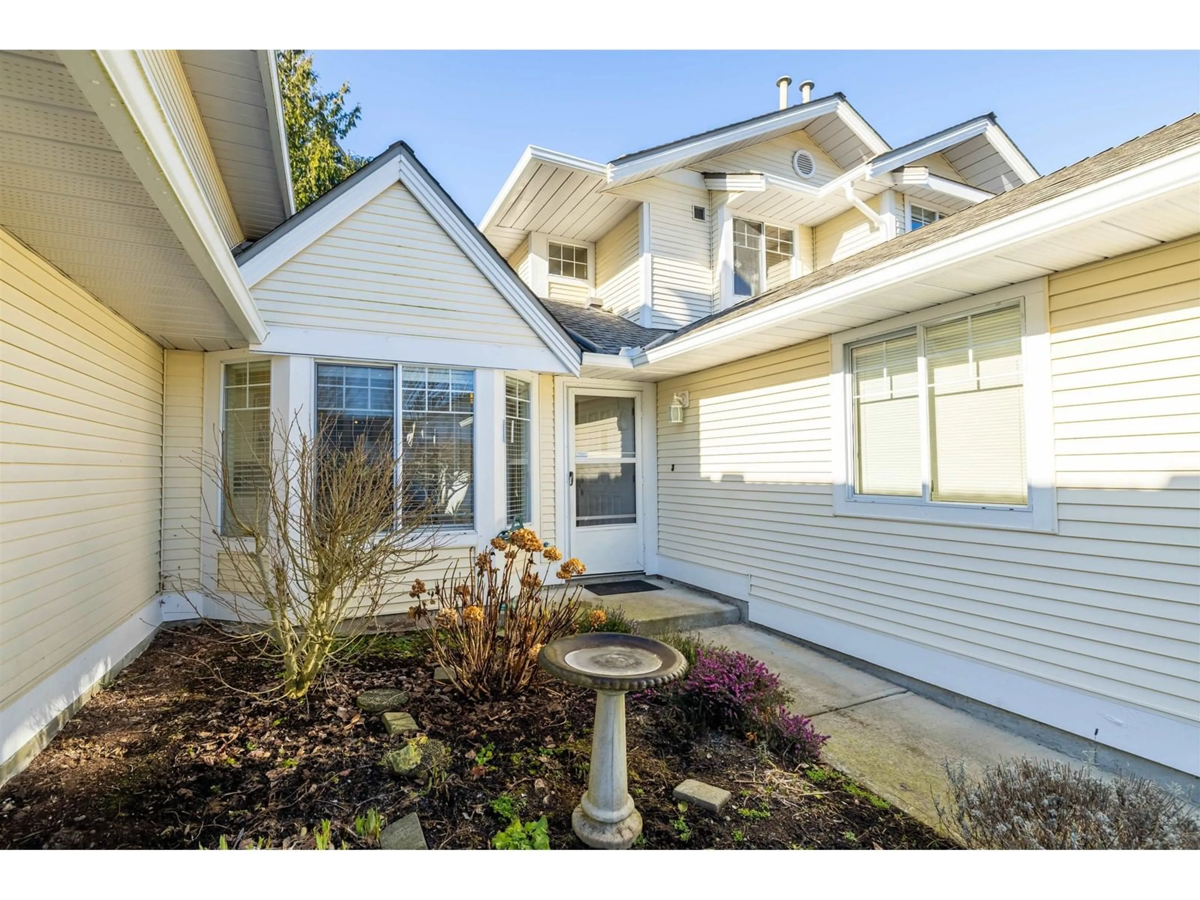 Home with vinyl exterior material, street for 80 8737 212 STREET, Langley British Columbia V1M2C8