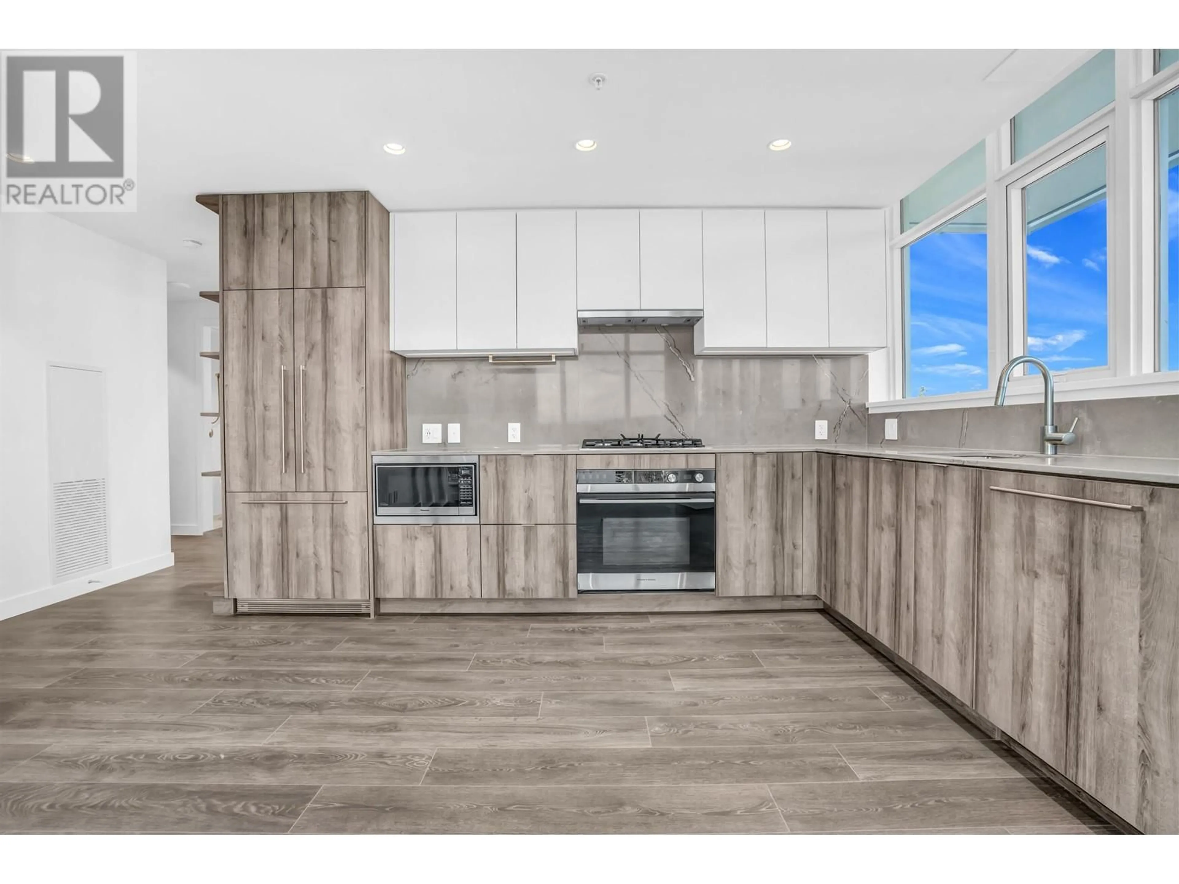 Open concept kitchen, wood/laminate floor for 808 505 NELSON STREET, Coquitlam British Columbia V3J0R5