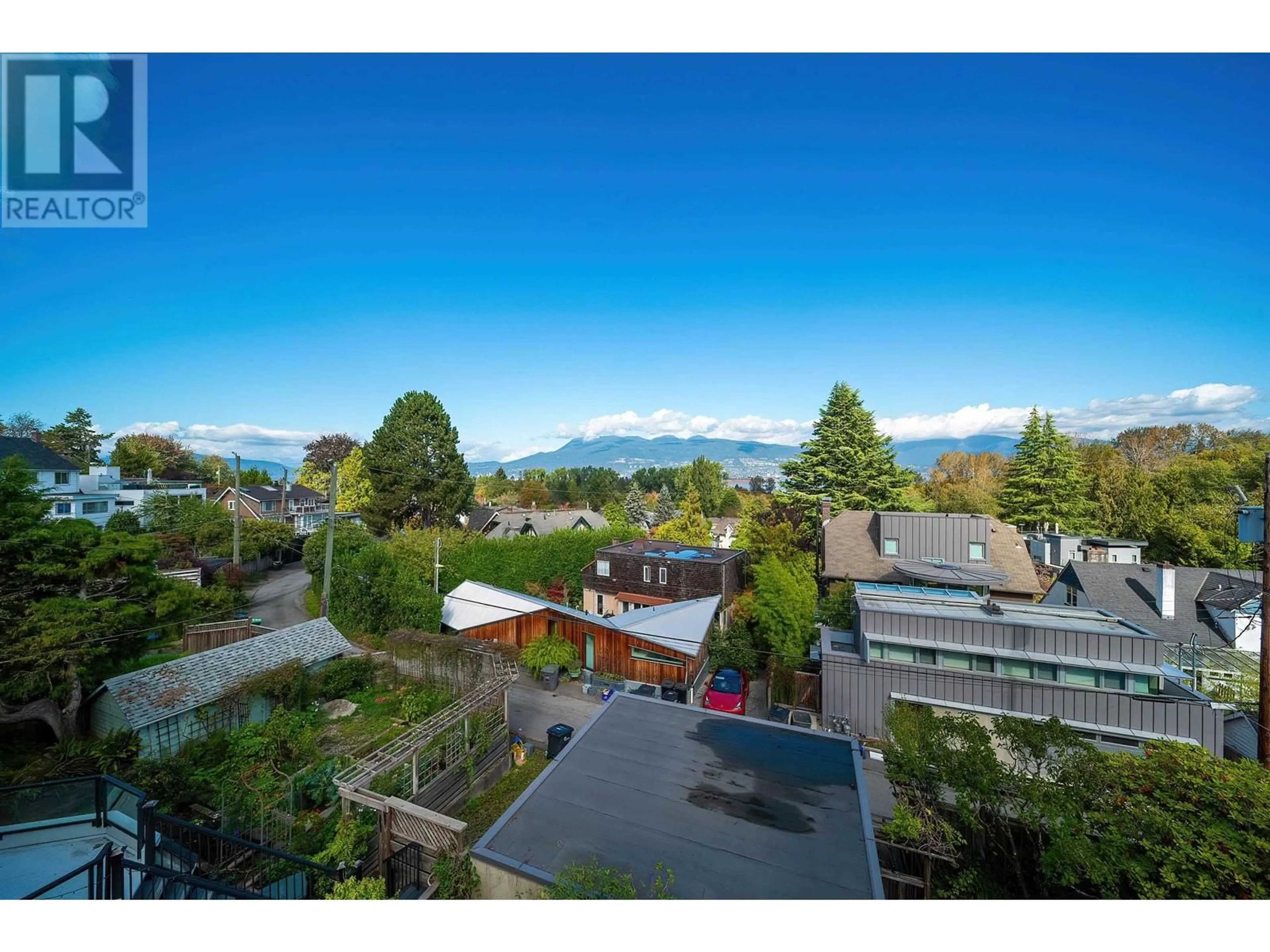 A pic from outside/outdoor area/front of a property/back of a property/a pic from drone, mountain view for 4333 LOCARNO CRESCENT, Vancouver British Columbia V6R1G2