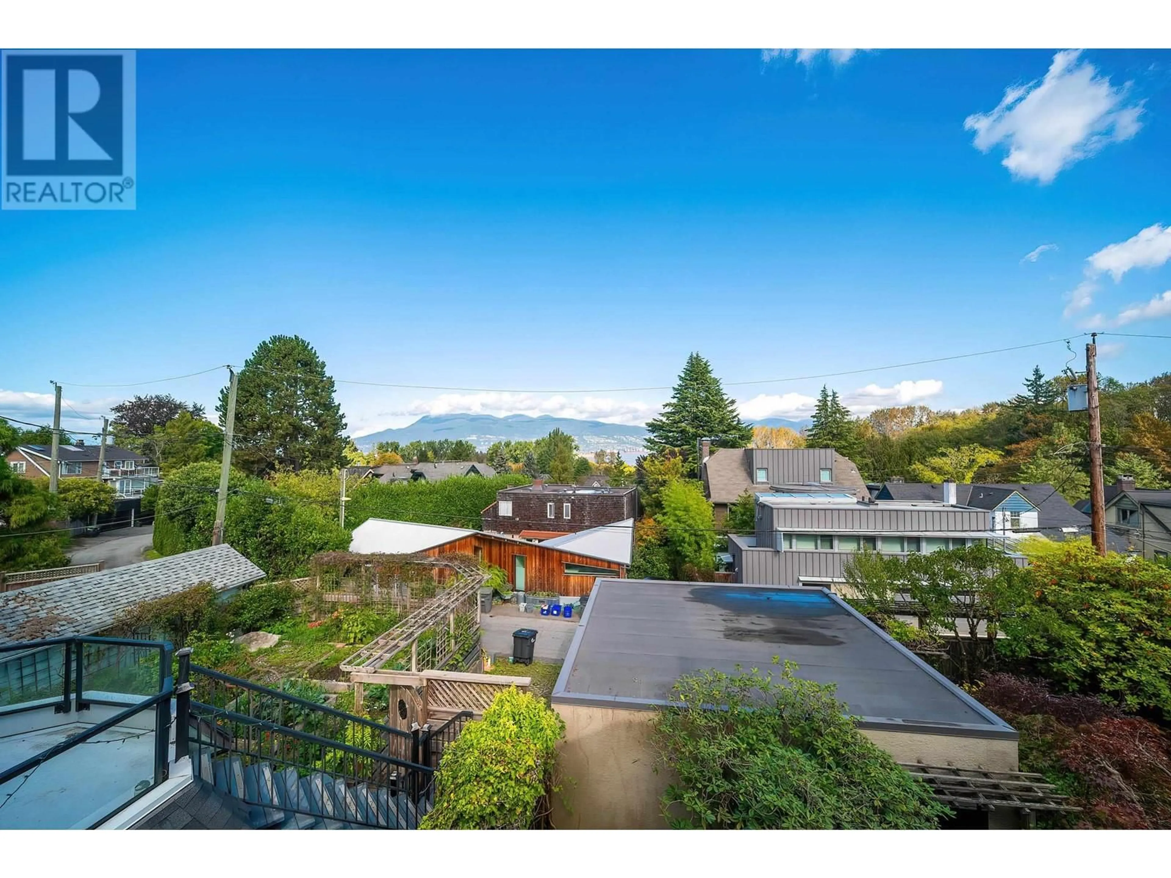 A pic from outside/outdoor area/front of a property/back of a property/a pic from drone, mountain view for 4333 LOCARNO CRESCENT, Vancouver British Columbia V6R1G2