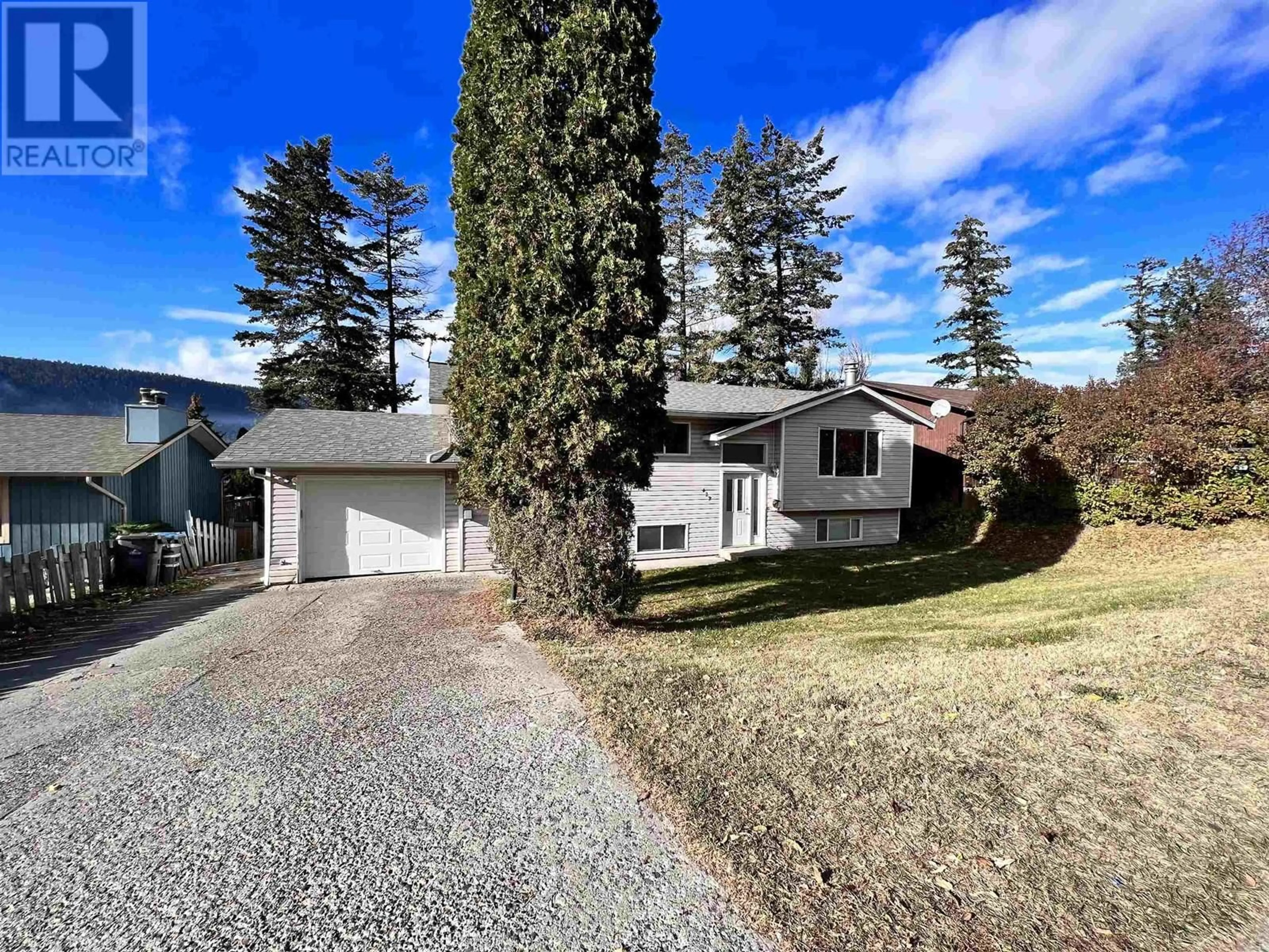 A pic from outside/outdoor area/front of a property/back of a property/a pic from drone, unknown for 427 MIDNIGHT DRIVE, Williams Lake British Columbia V2G4E4