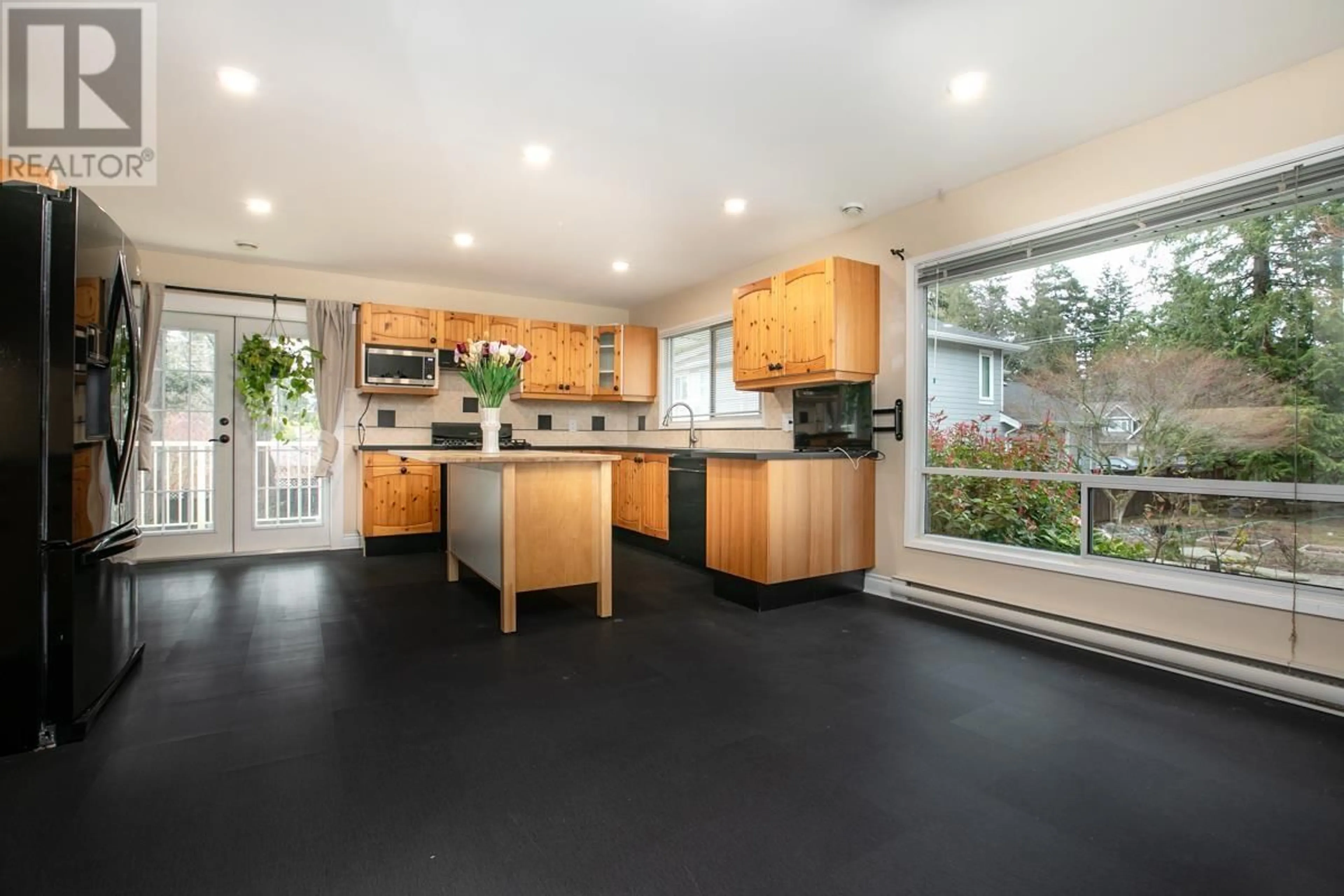 Open concept kitchen, unknown for 5065 1 AVENUE, Delta British Columbia V4M1B4
