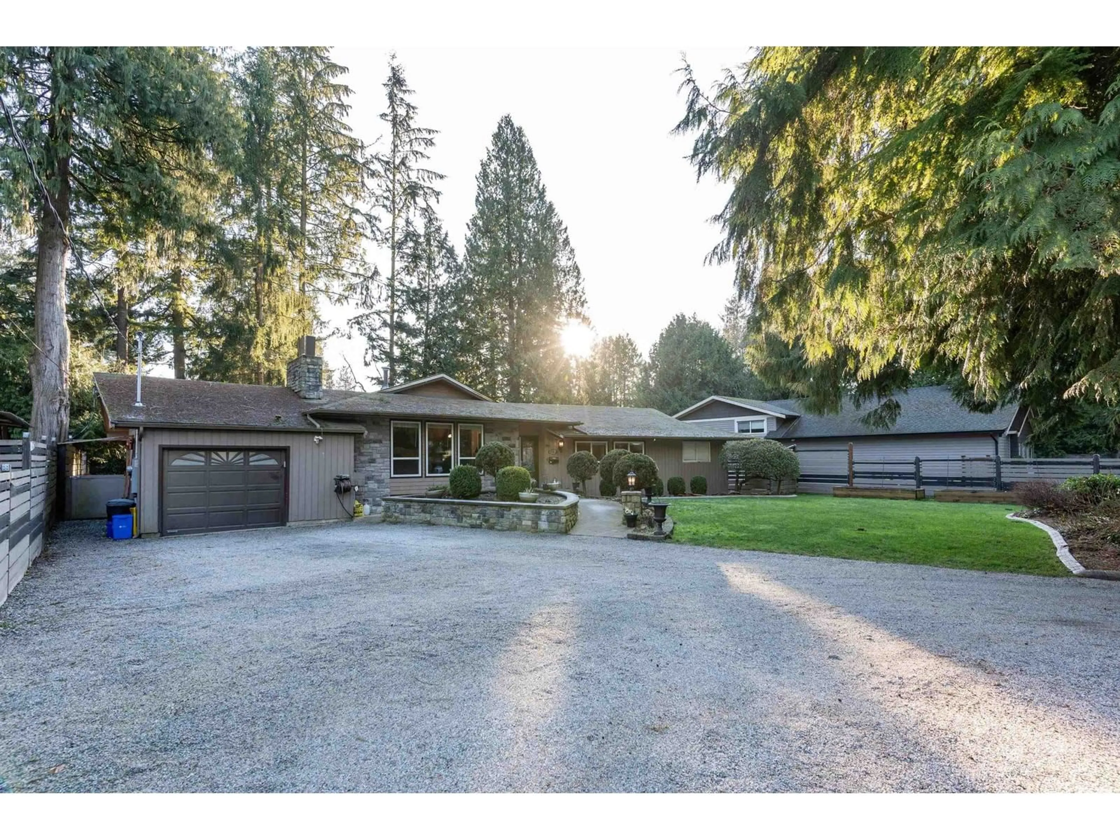 A pic from outside/outdoor area/front of a property/back of a property/a pic from drone, street for 20490 46 AVENUE, Langley British Columbia V3A3L6