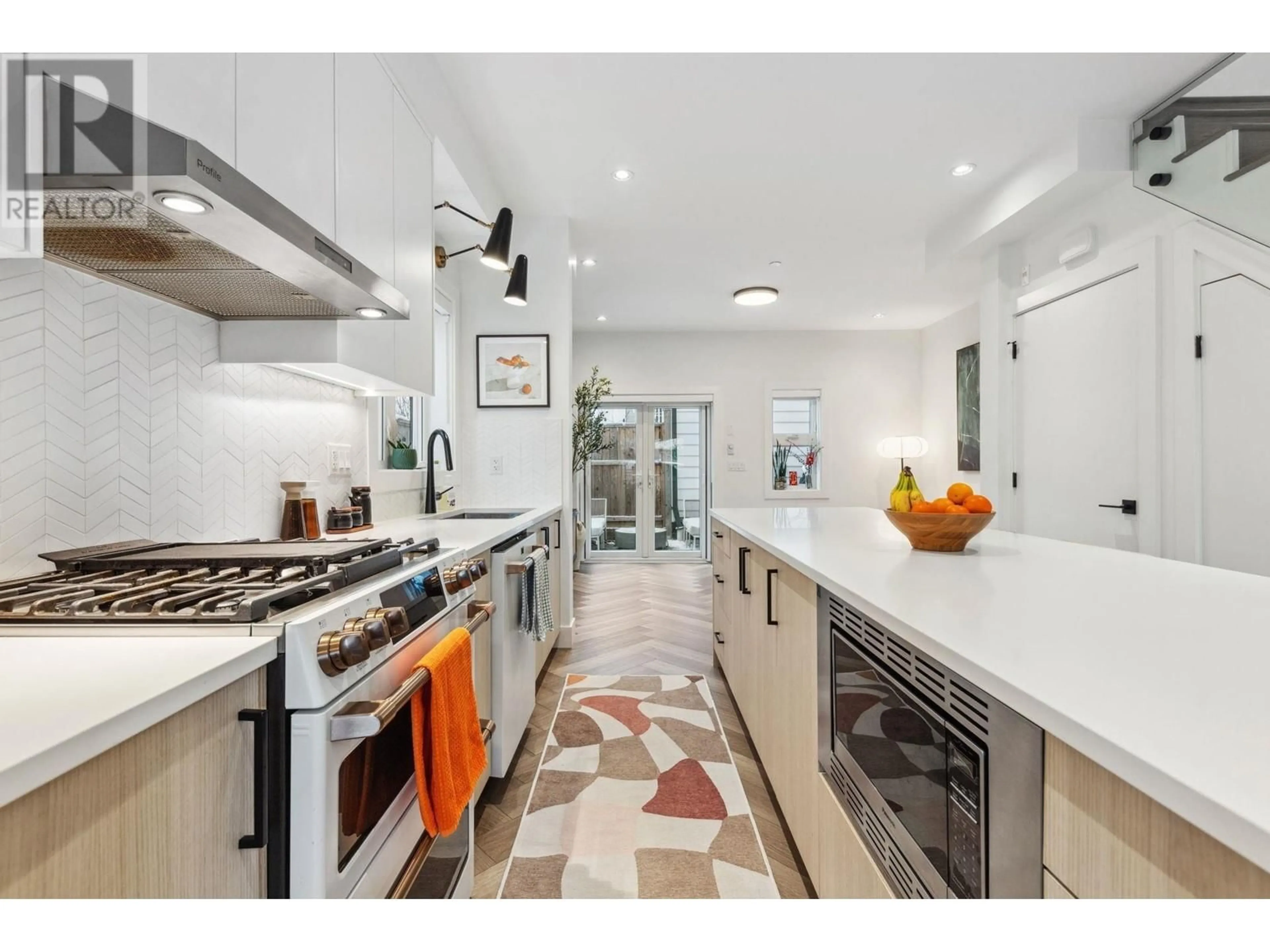 Contemporary kitchen, ceramic/tile floor for 2318 E 34TH AVENUE, Vancouver British Columbia V5R2S7