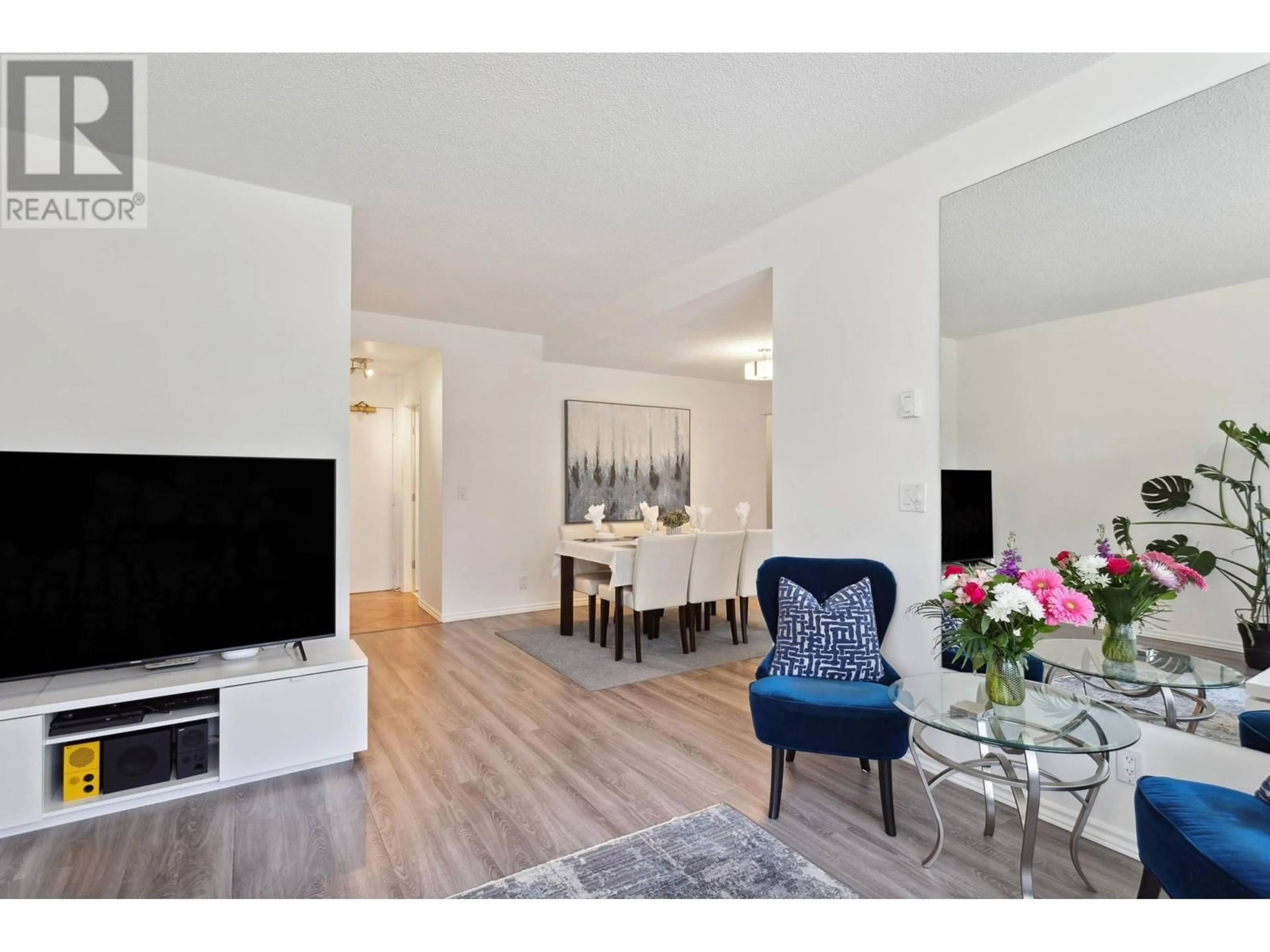 Living room with furniture, wood/laminate floor for 201 2668 ASH STREET, Vancouver British Columbia V5Z4K4