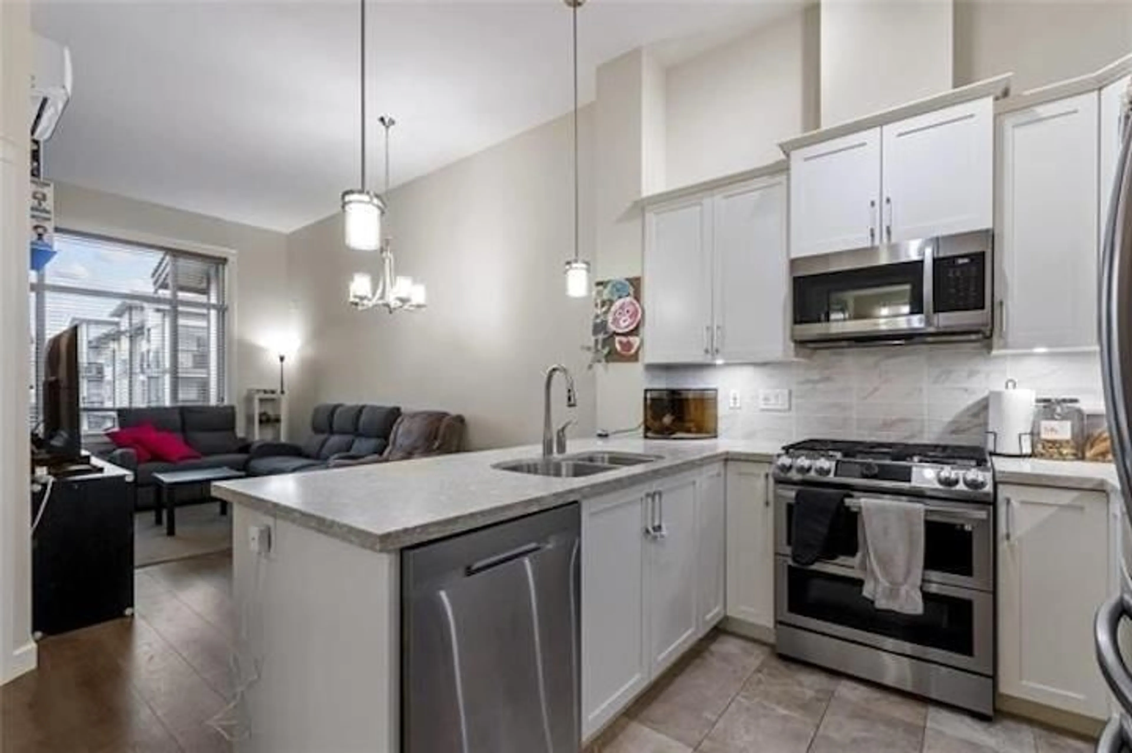 Open concept kitchen, unknown for 612 8561 203A STREET, Langley British Columbia V2Y3L7