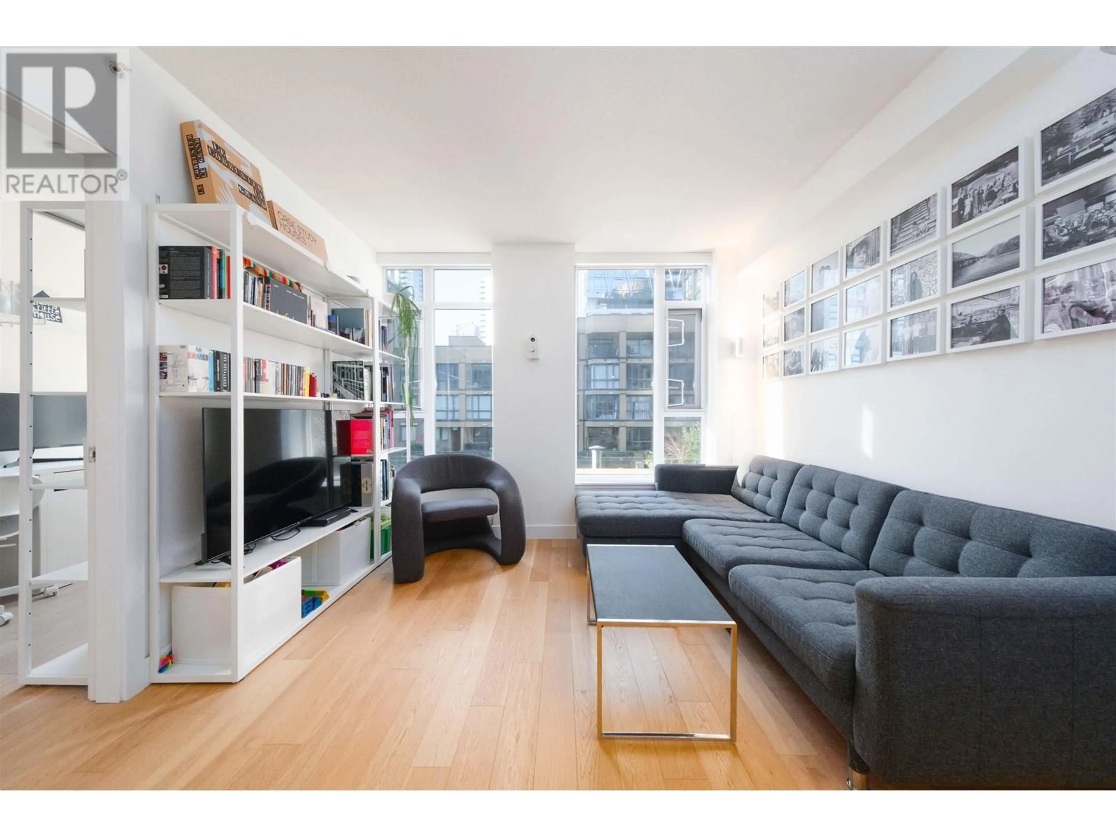 Living room with furniture, wood/laminate floor for 402 1133 HOMER STREET, Vancouver British Columbia V6B0B1