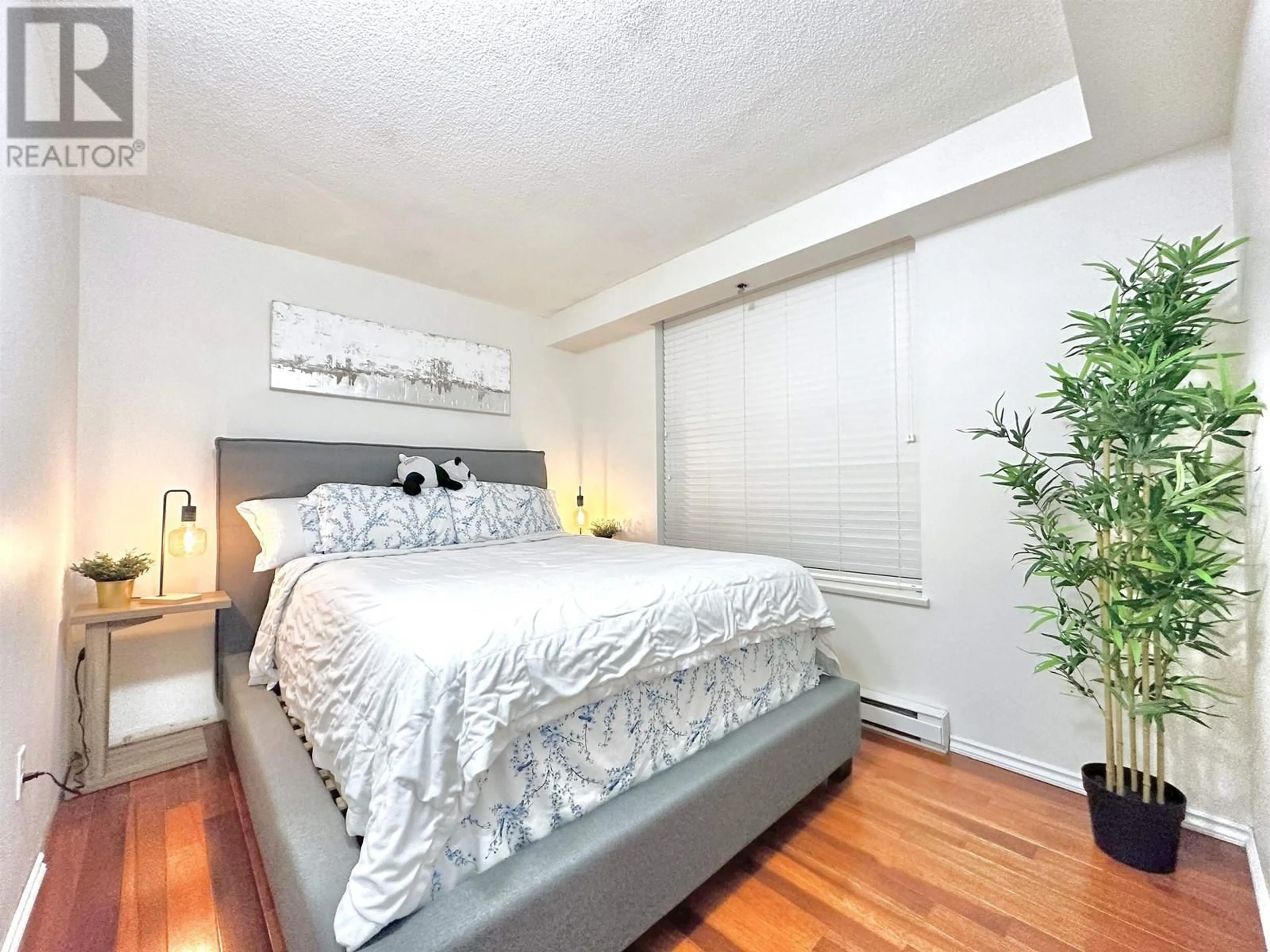 Bedroom with bed, wood/laminate floor for 105 1189 EASTWOOD STREET, Coquitlam British Columbia V3B7N5