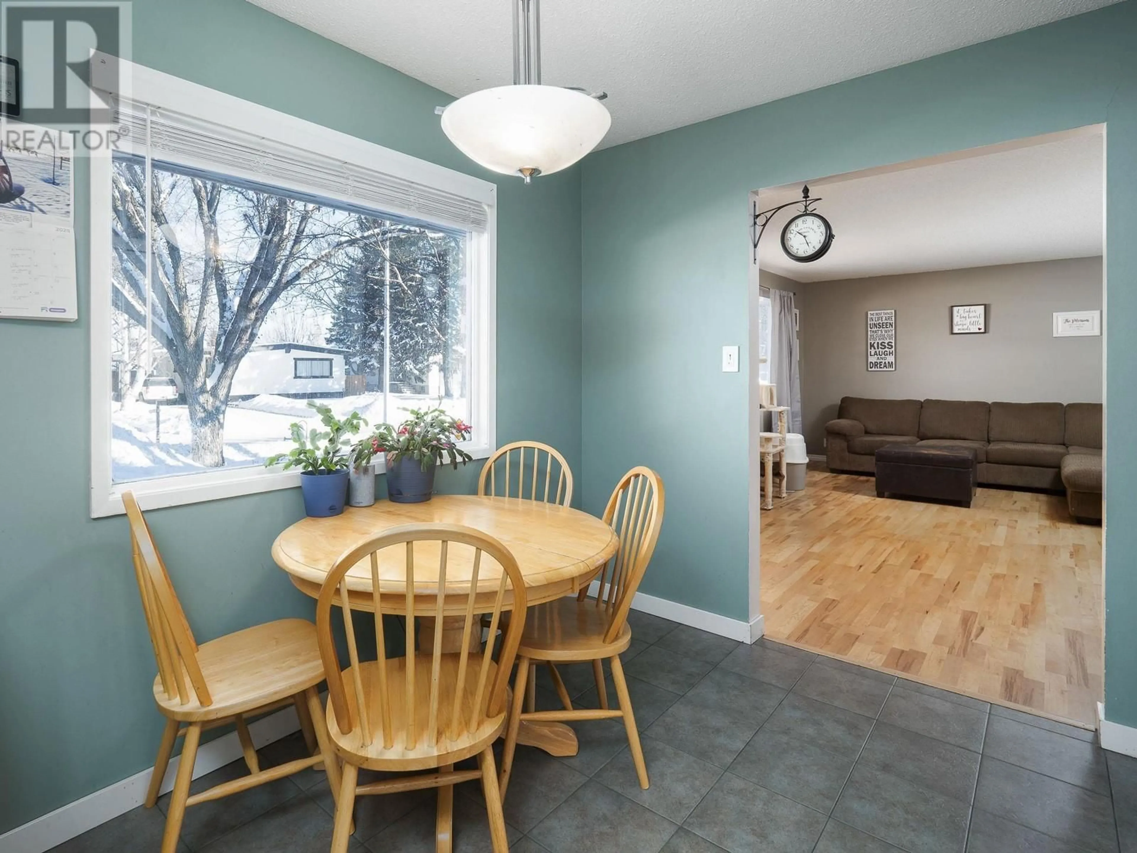 Dining room, wood/laminate floor for 143 FERN CRESCENT, Prince George British Columbia V2N1J3