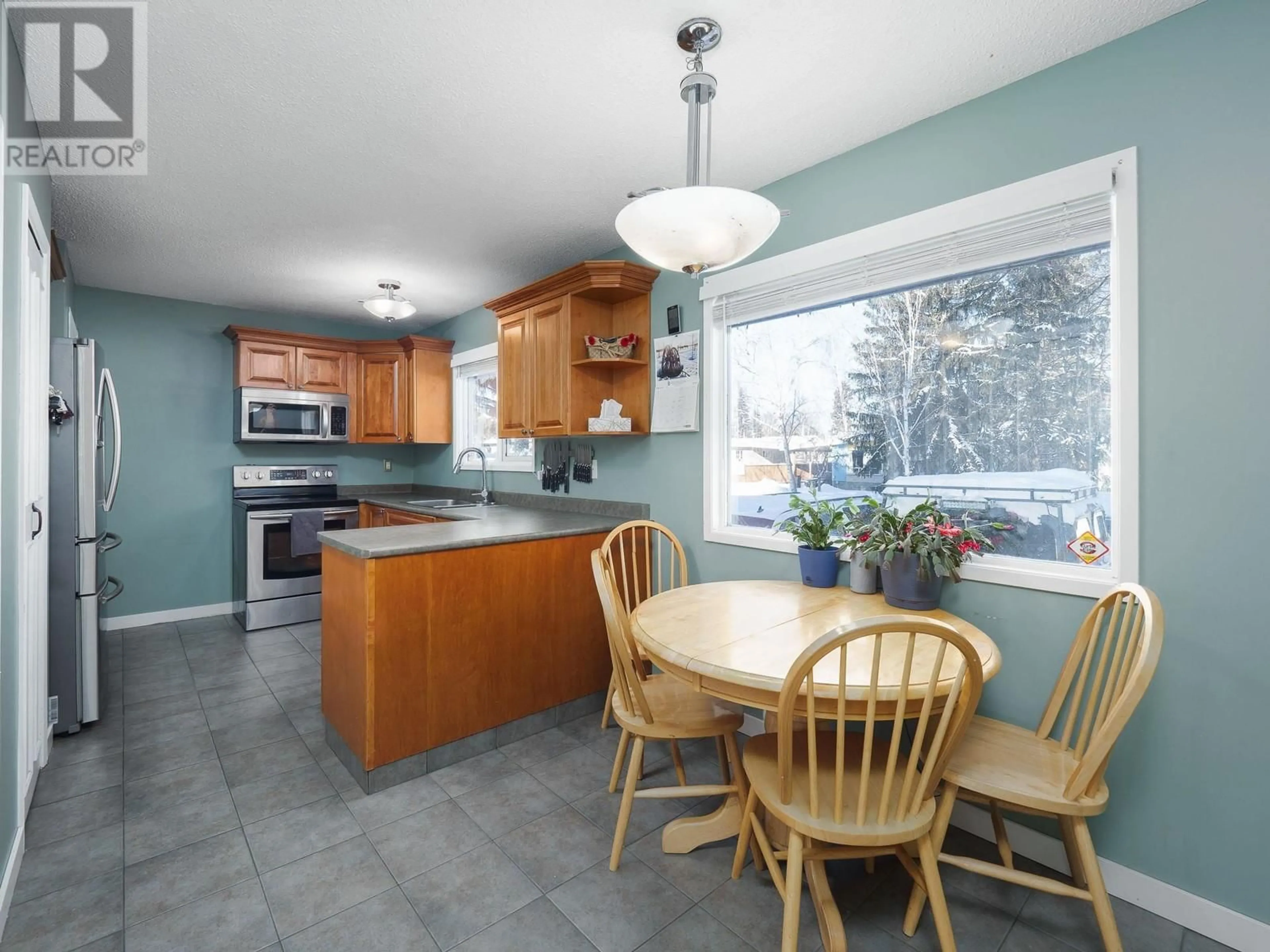 Open concept kitchen, ceramic/tile floor for 143 FERN CRESCENT, Prince George British Columbia V2N1J3