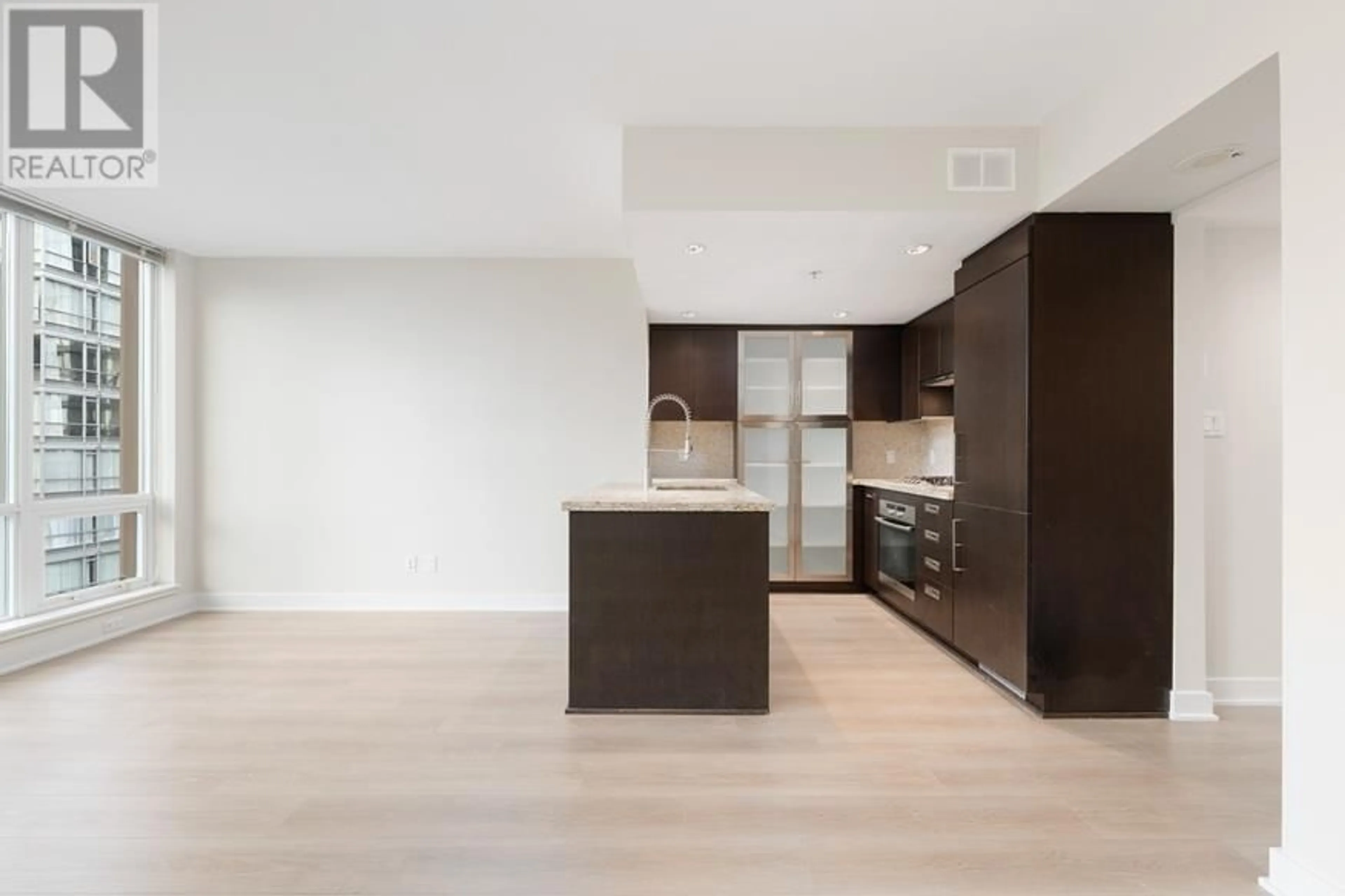 Open concept kitchen, wood/laminate floor for 1803 1055 RICHARDS STREET, Vancouver British Columbia V6B0C2