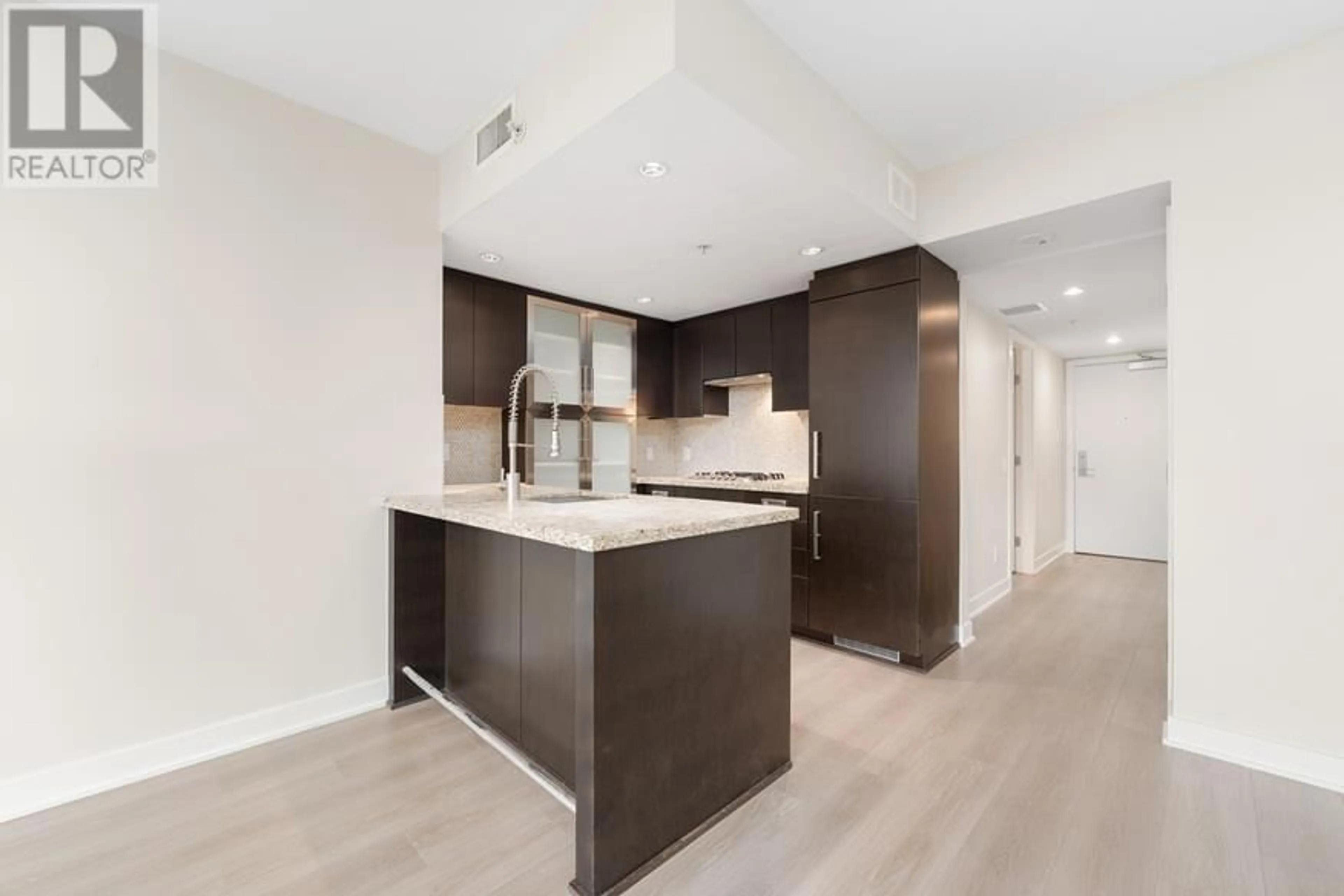 Open concept kitchen, wood/laminate floor for 1803 1055 RICHARDS STREET, Vancouver British Columbia V6B0C2