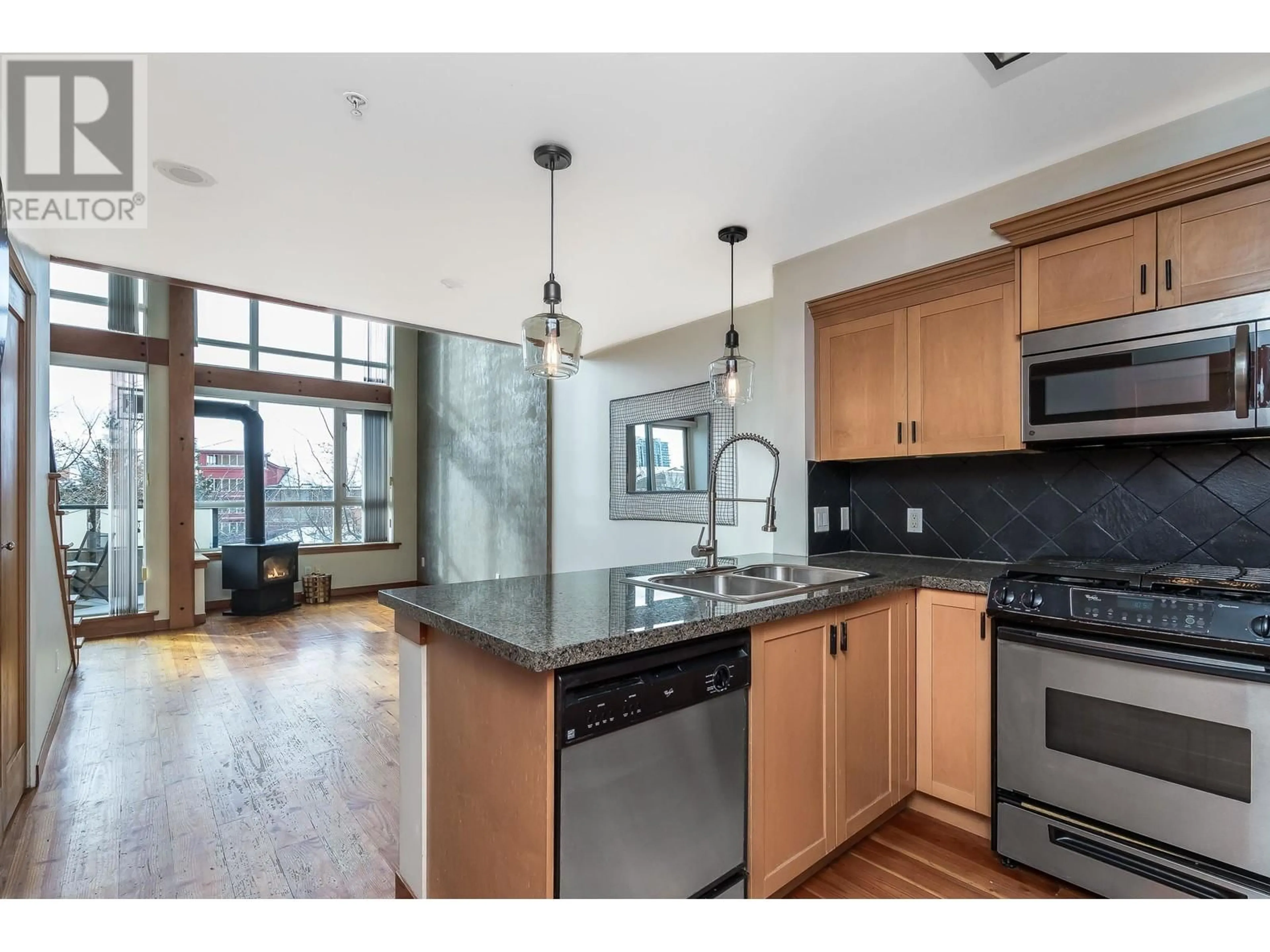 Open concept kitchen, unknown for 213 7 RIALTO COURT, New Westminster British Columbia V3M7A8