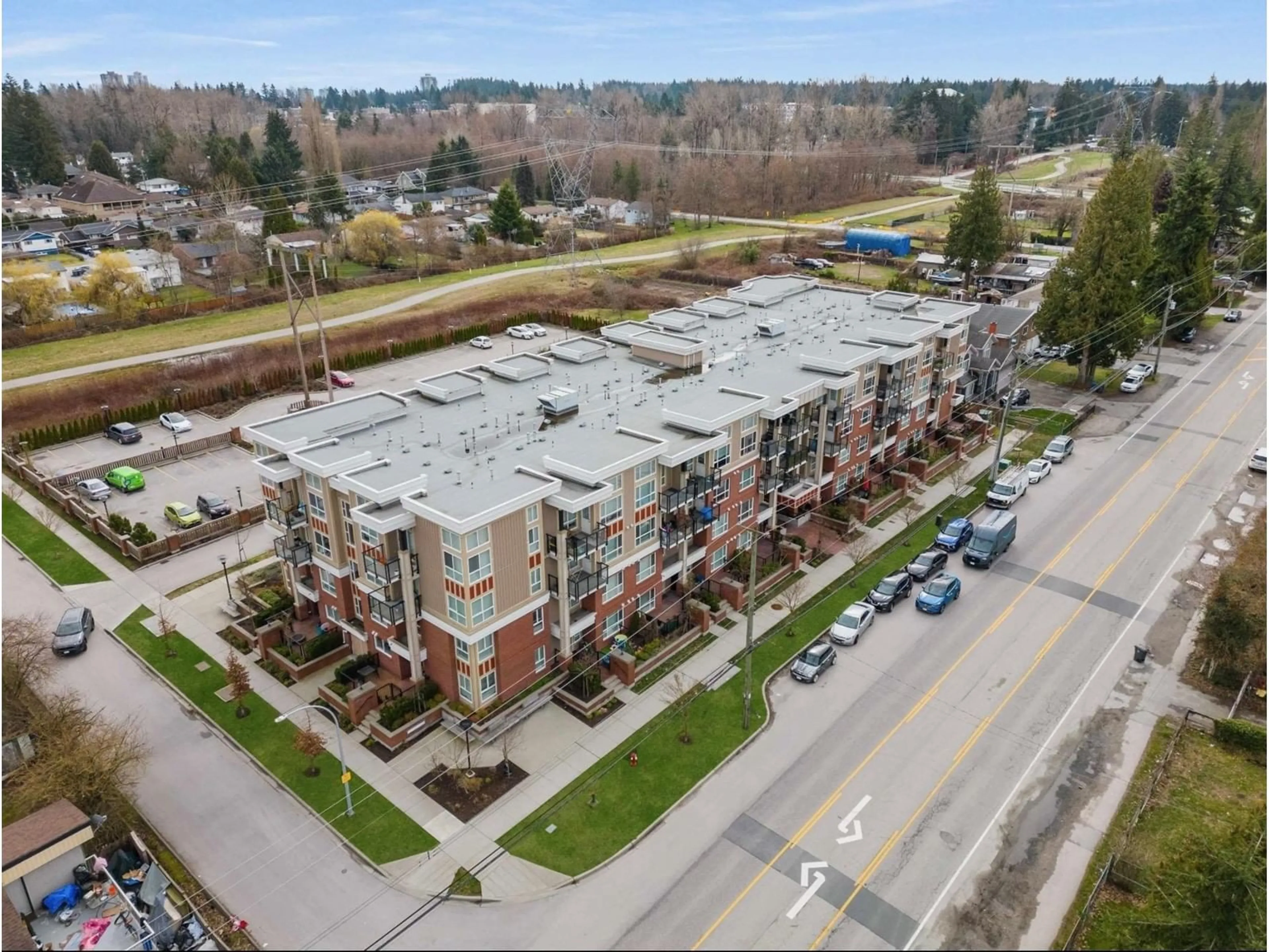 A pic from outside/outdoor area/front of a property/back of a property/a pic from drone, unknown for 408 10688 140 STREET, Surrey British Columbia V3T4N8