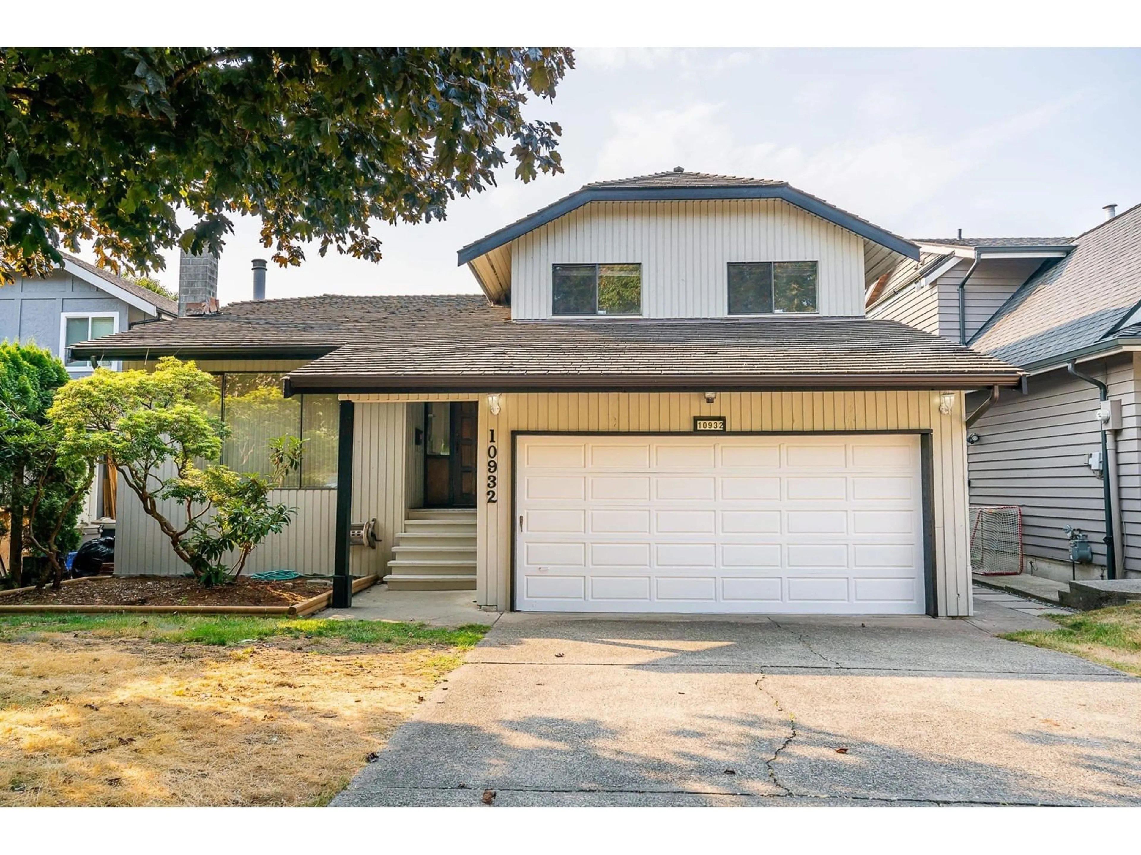 Home with vinyl exterior material, street for 10932 63A, Delta British Columbia V4E3B6
