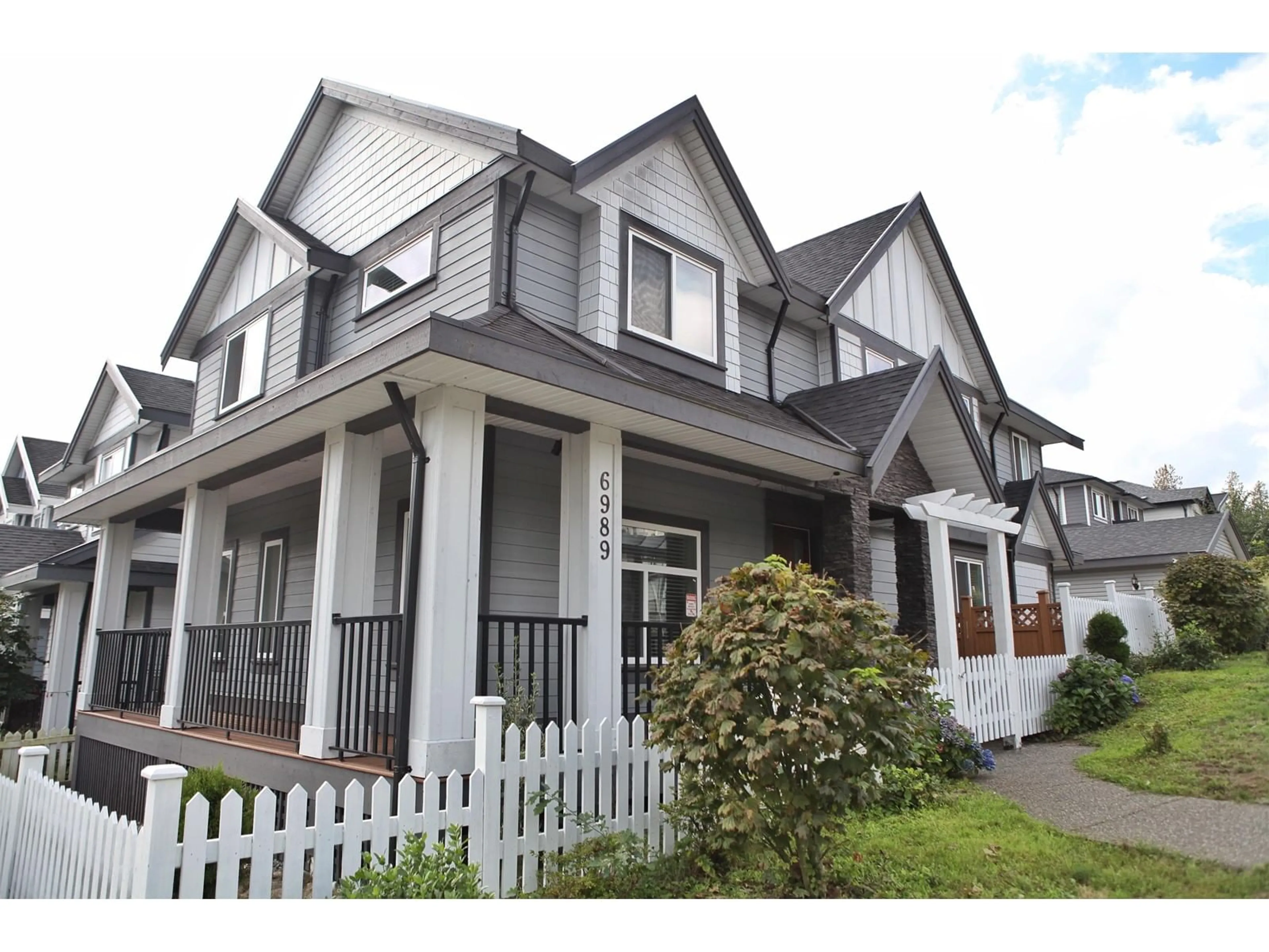 Home with vinyl exterior material, street for 6989 206 STREET, Langley British Columbia V2Y0W4