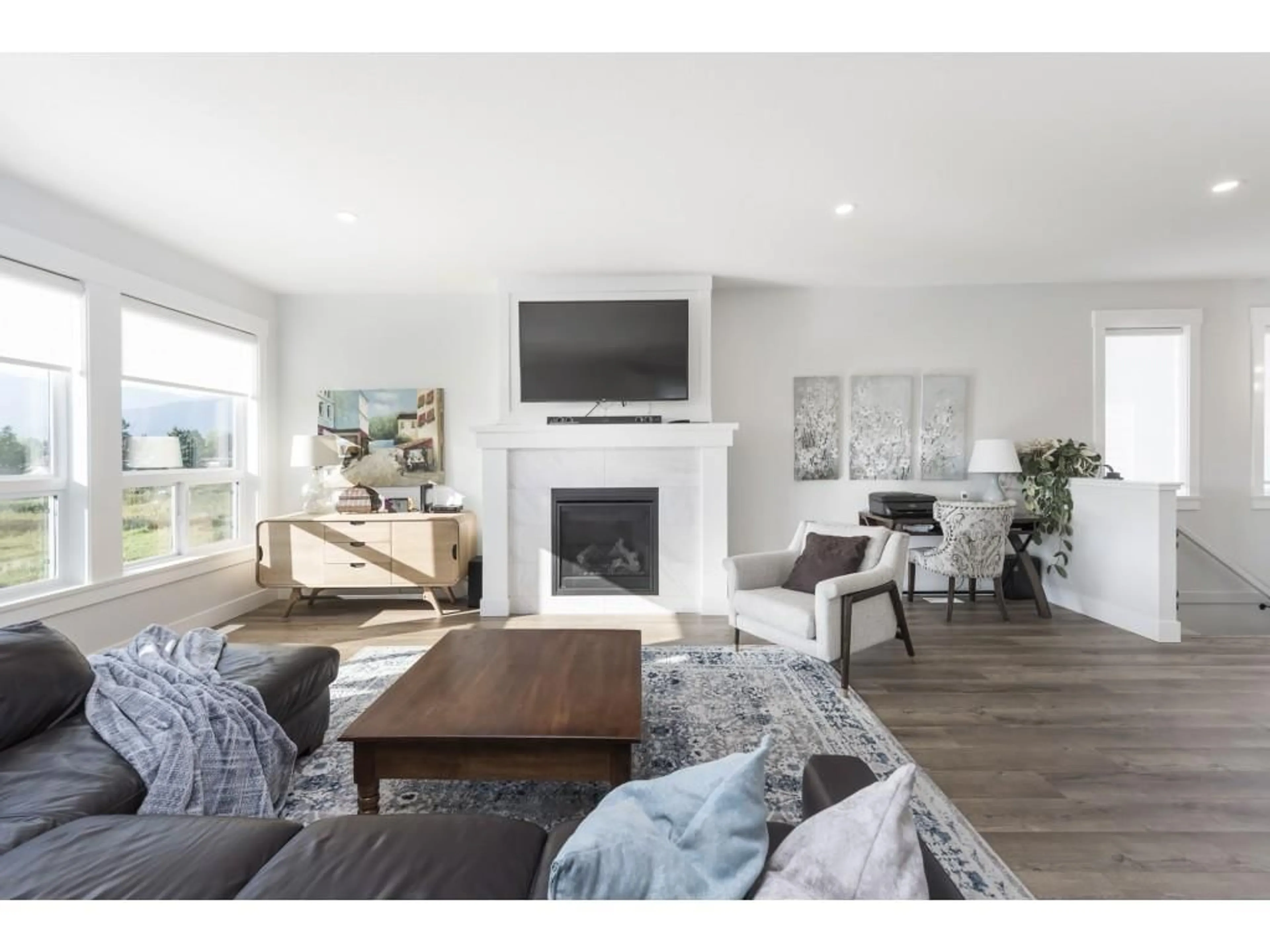 Living room with furniture, wood/laminate floor for 9279 SITKA PLACE, Chilliwack British Columbia V2P8B6