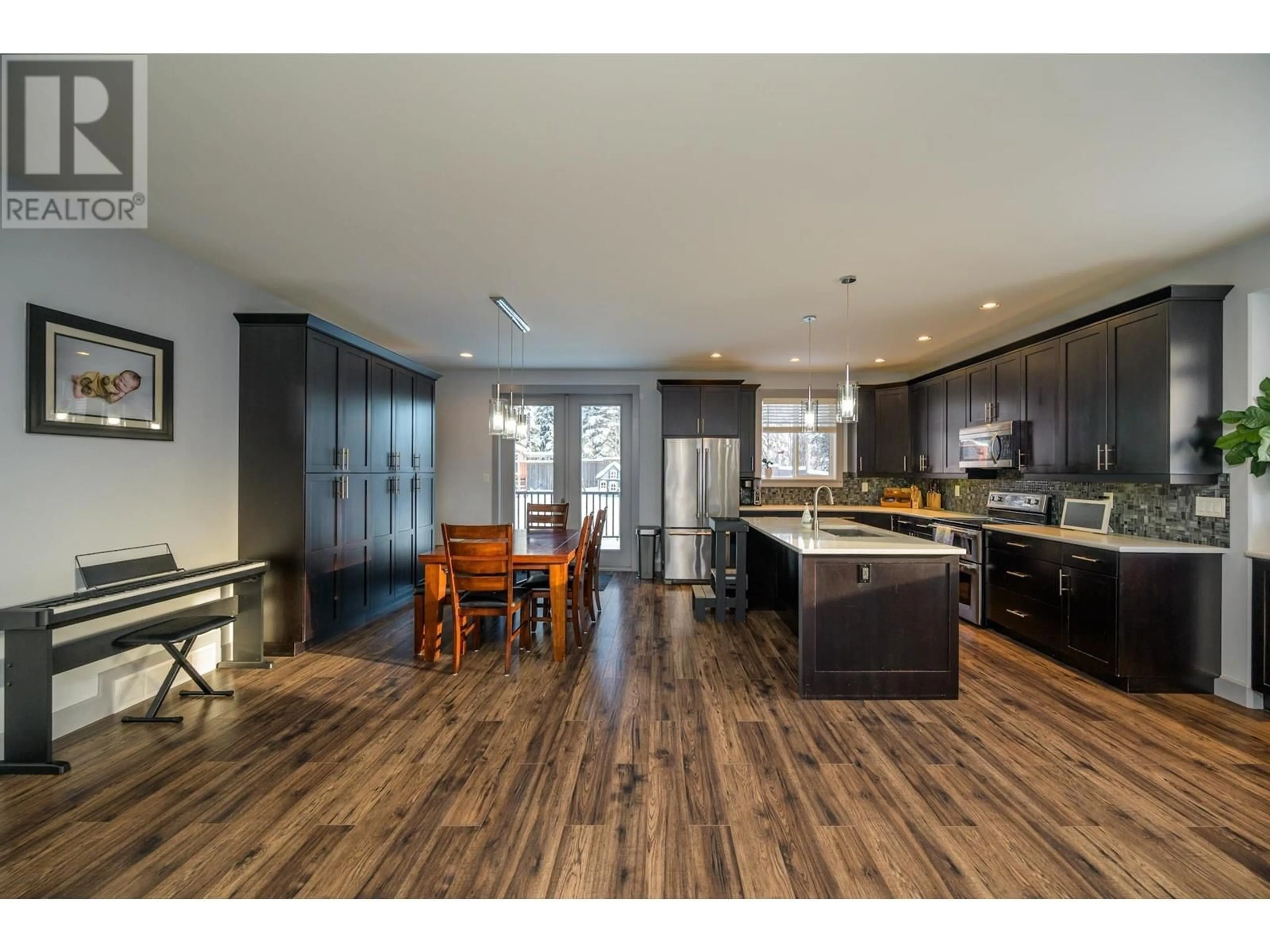 Open concept kitchen, wood/laminate floor for 2838 MAURICE DRIVE, Prince George British Columbia V2N0C8