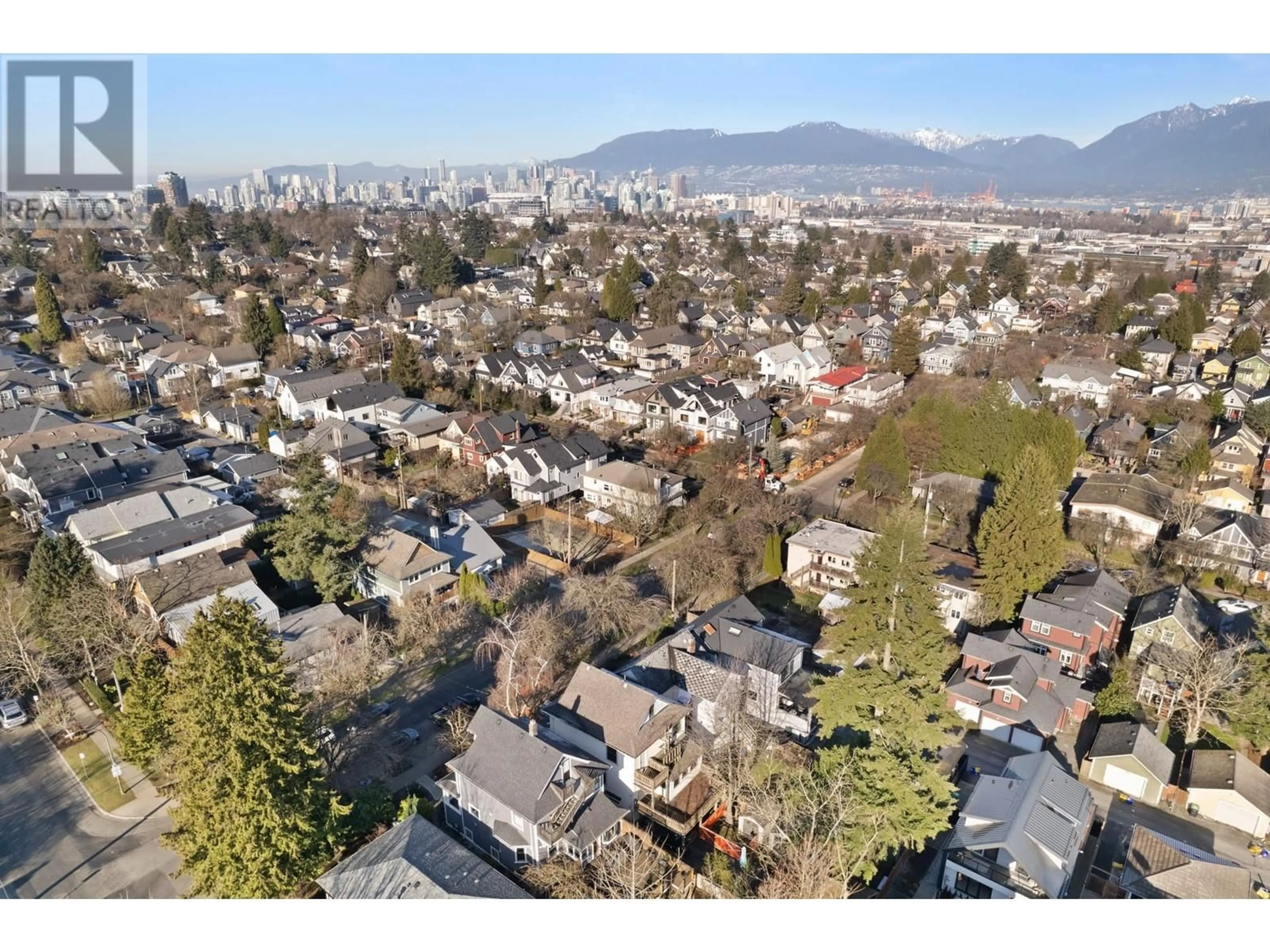 A pic from outside/outdoor area/front of a property/back of a property/a pic from drone, mountain view for 3044 GLEN DRIVE, Vancouver British Columbia V5T4C1