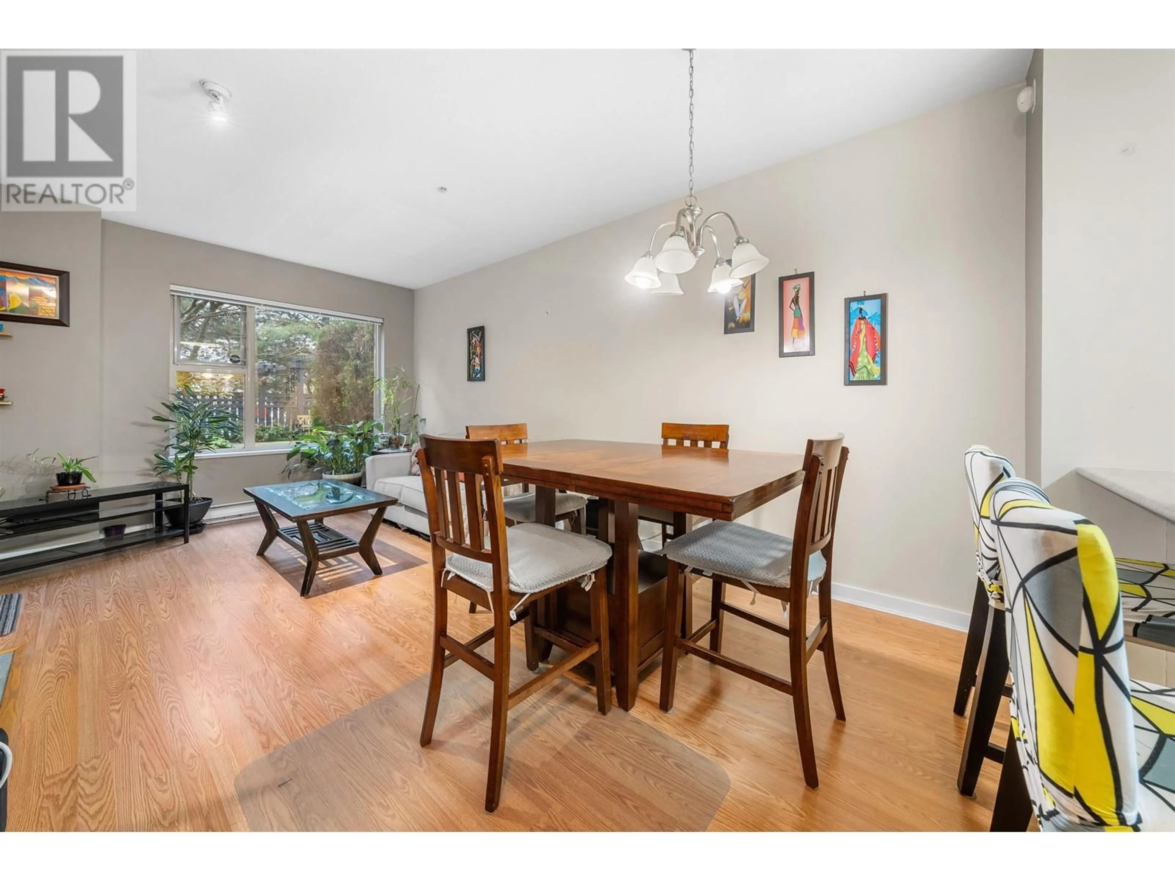 Dining room, wood/laminate floor for 108 808 SANGSTER PLACE, New Westminster British Columbia V3L5W3